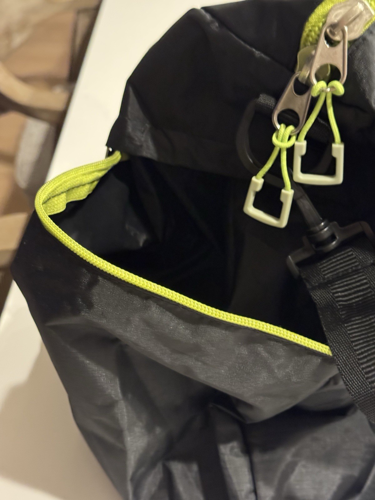 Coleman Flex Duffel Bag. Black and Neon Green with Shoulder Strap.