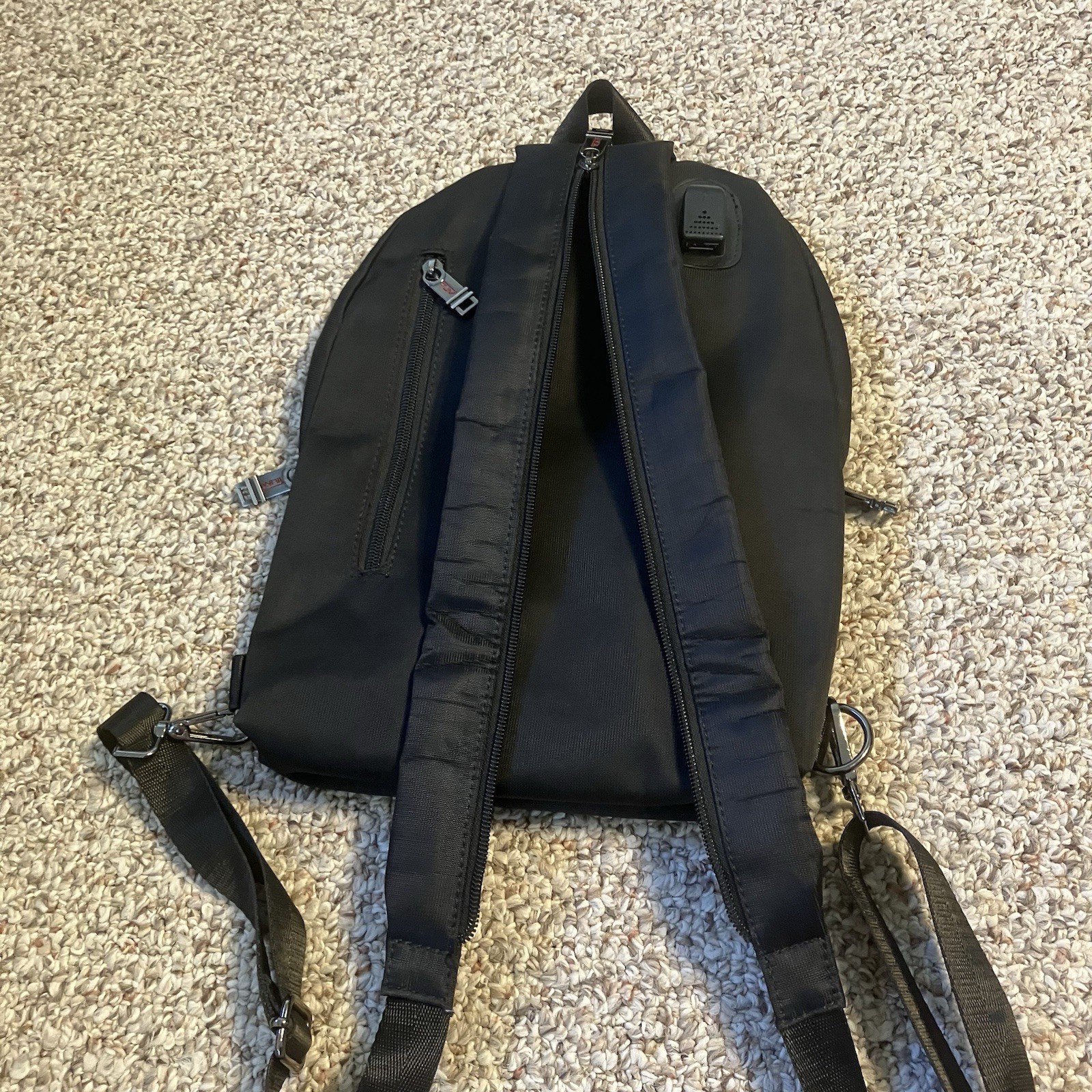 Tumi Black Small Travel Backpack Convertible to Sling Bag Zipper Pockets Charger
