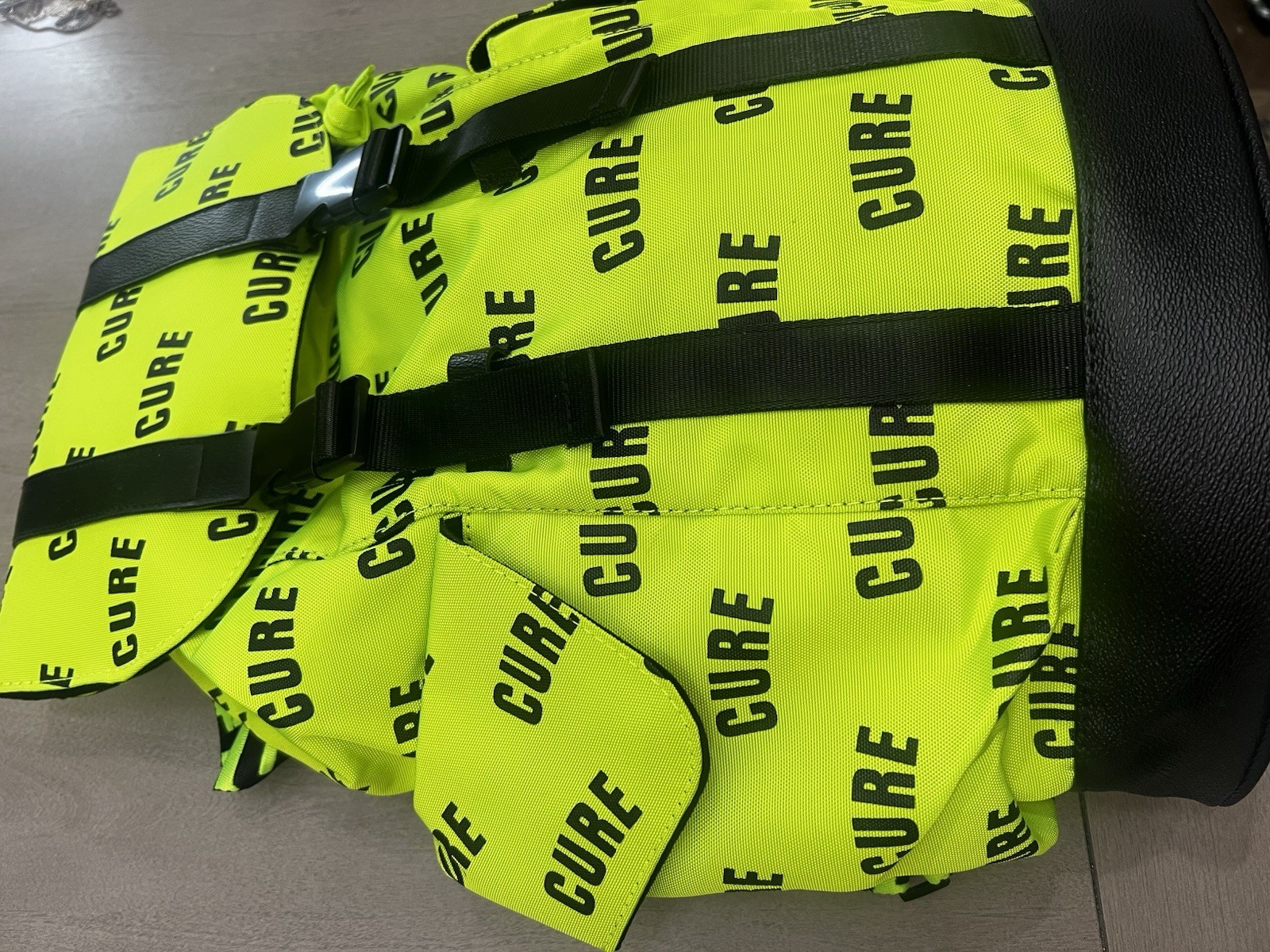 Green/Black CURE Logo Print Backpack Drawstring Buckle Adjustable Straps