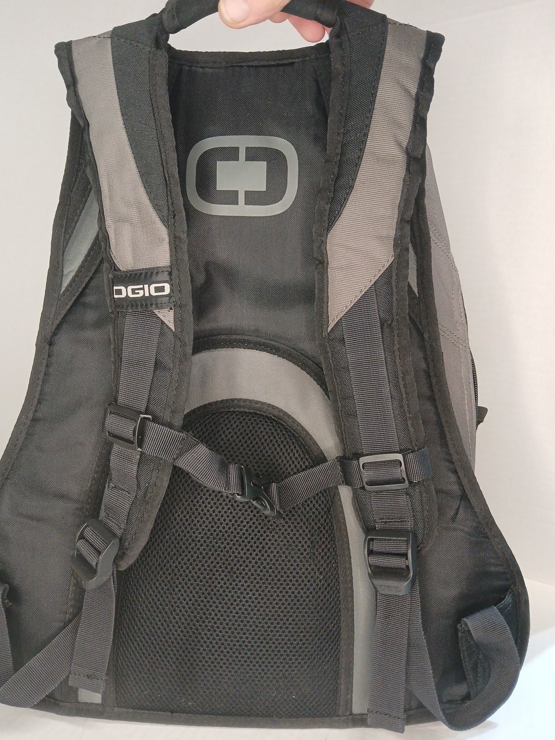ogio backpack, Fugitive.Laptop compartment and phone compartment with cable port