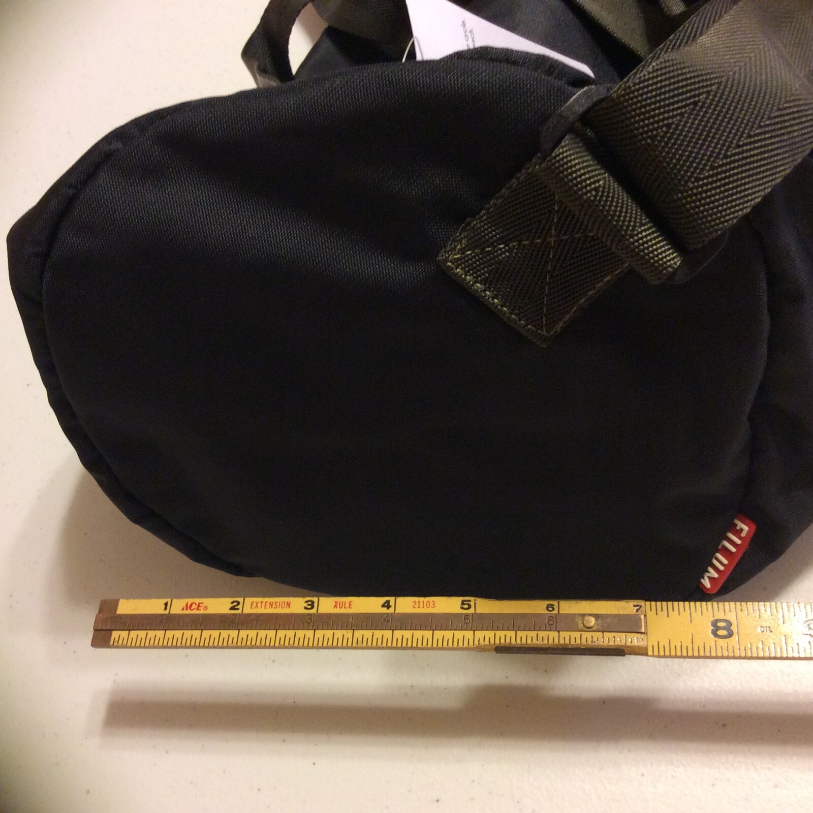 Filum black duffle bag 8”x7”x16” New with tags Water resistant