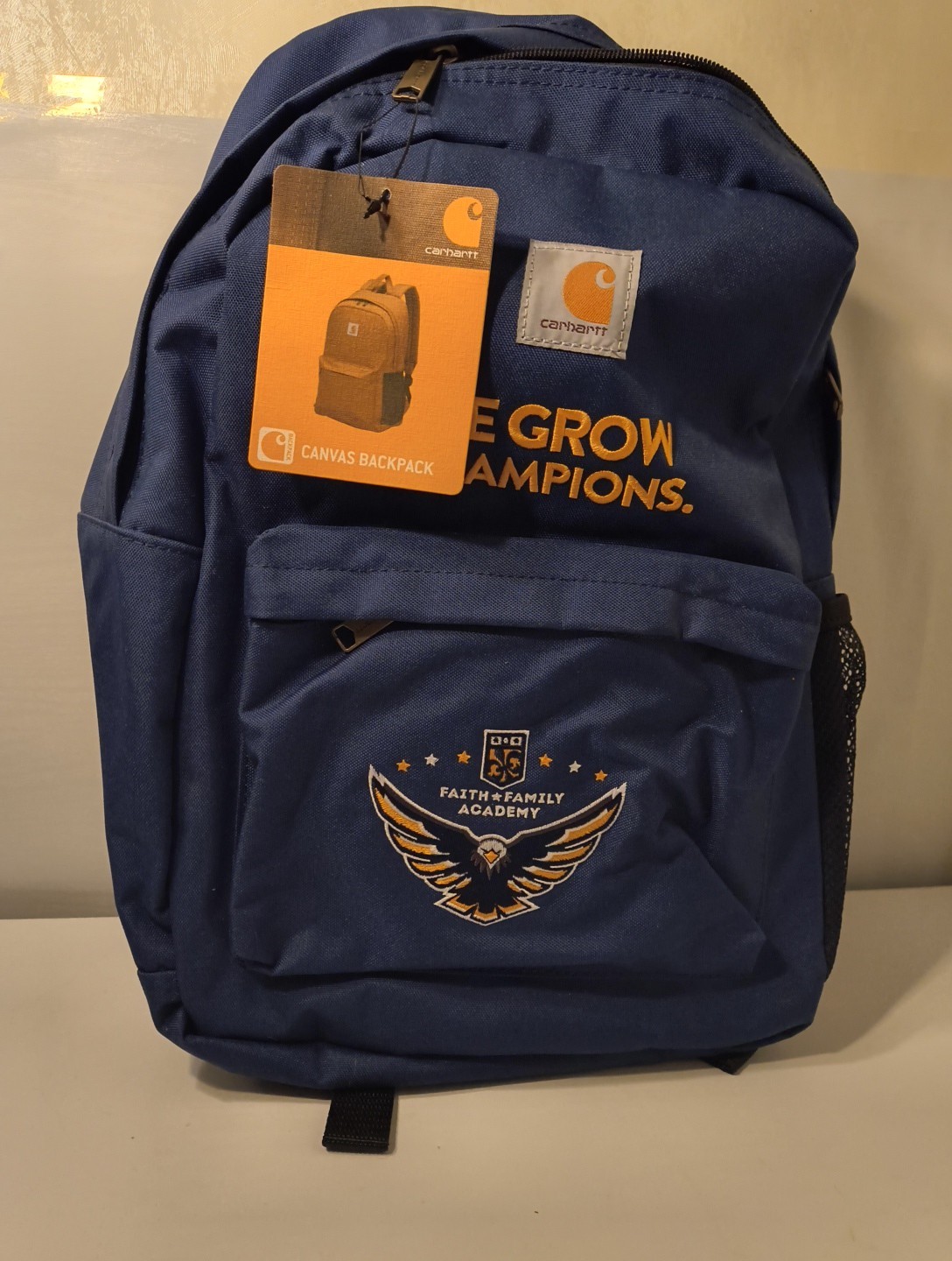 Carhartt Canvas Backpack blue 18″ X 14″ We Grow Champions Faith Family Academy
