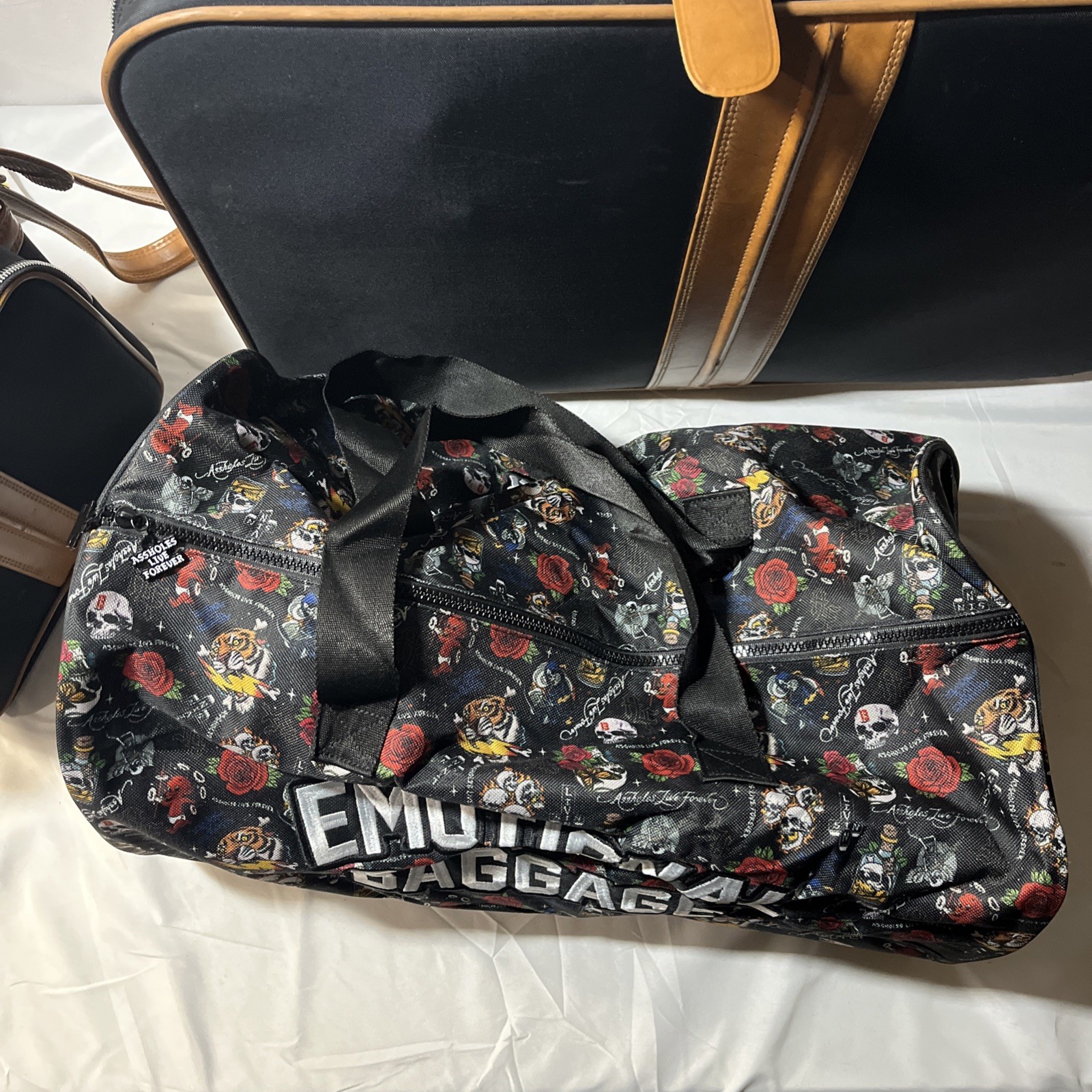A**holes Live Forever Emotional Baggage Duffel Bag Skull Bottle All-Over Print