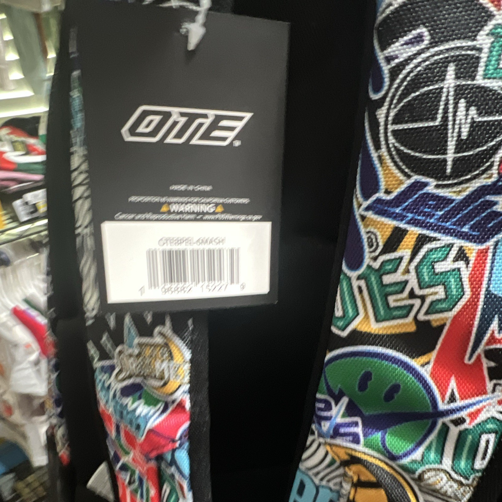 OTB Men’s Graphic Print Zip Backpack w/ Pockets, Multicolor/Black Travel