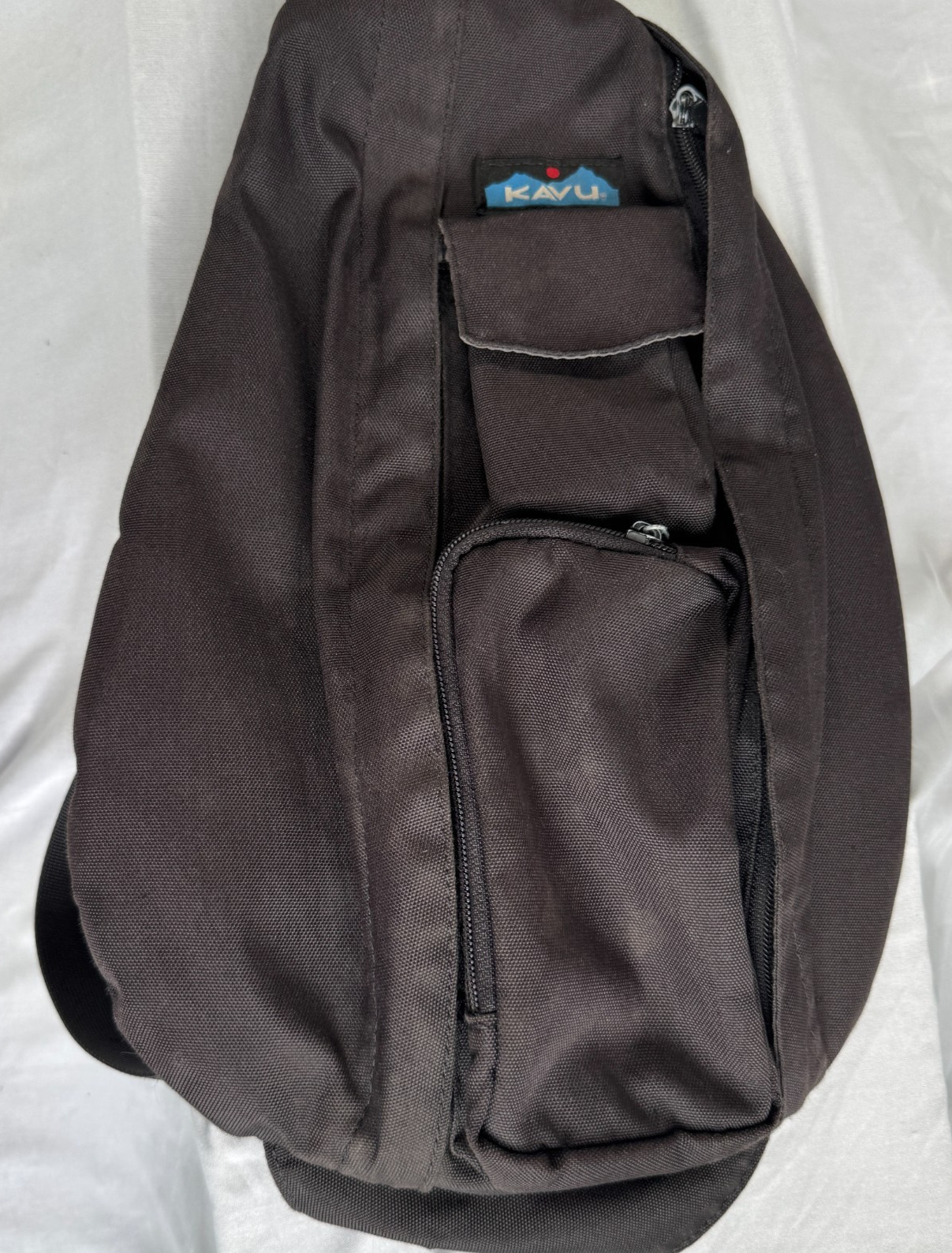 KAVU Rope Sling Bag Crossbody Backpack Black Embroidered Logo Adjustable Strap