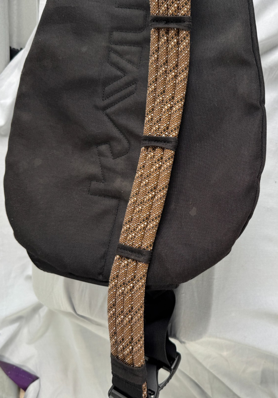 KAVU Rope Sling Bag Crossbody Backpack Black Embroidered Logo Adjustable Strap