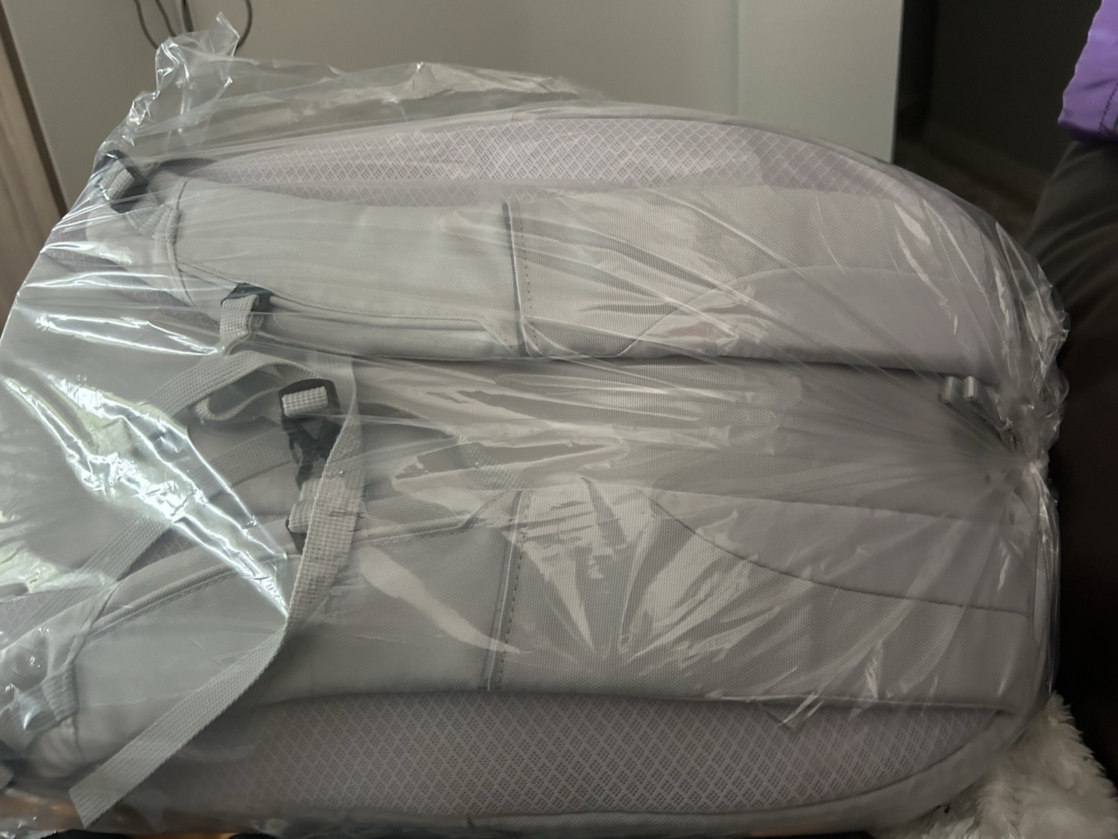 Sporty 19” backpack silver.  All in motion. Brand new