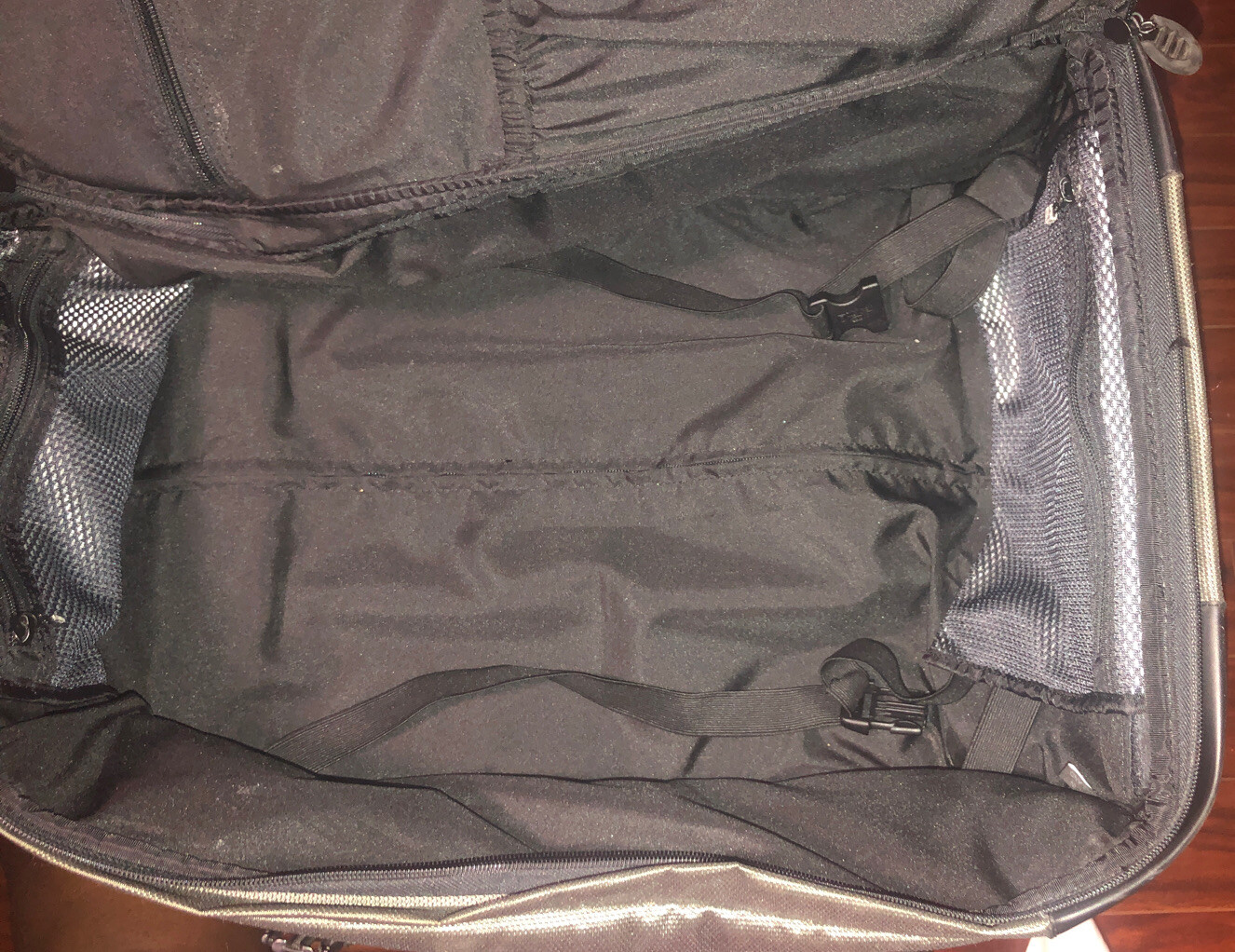 Used Tumi T2 Nylon Olive Green and Black Backpack Suitcase With Wheels.