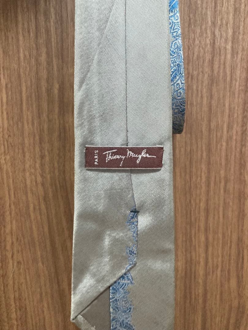 Thierry Mugler Elegant Ivory Tie with Blue Decorative Pattern