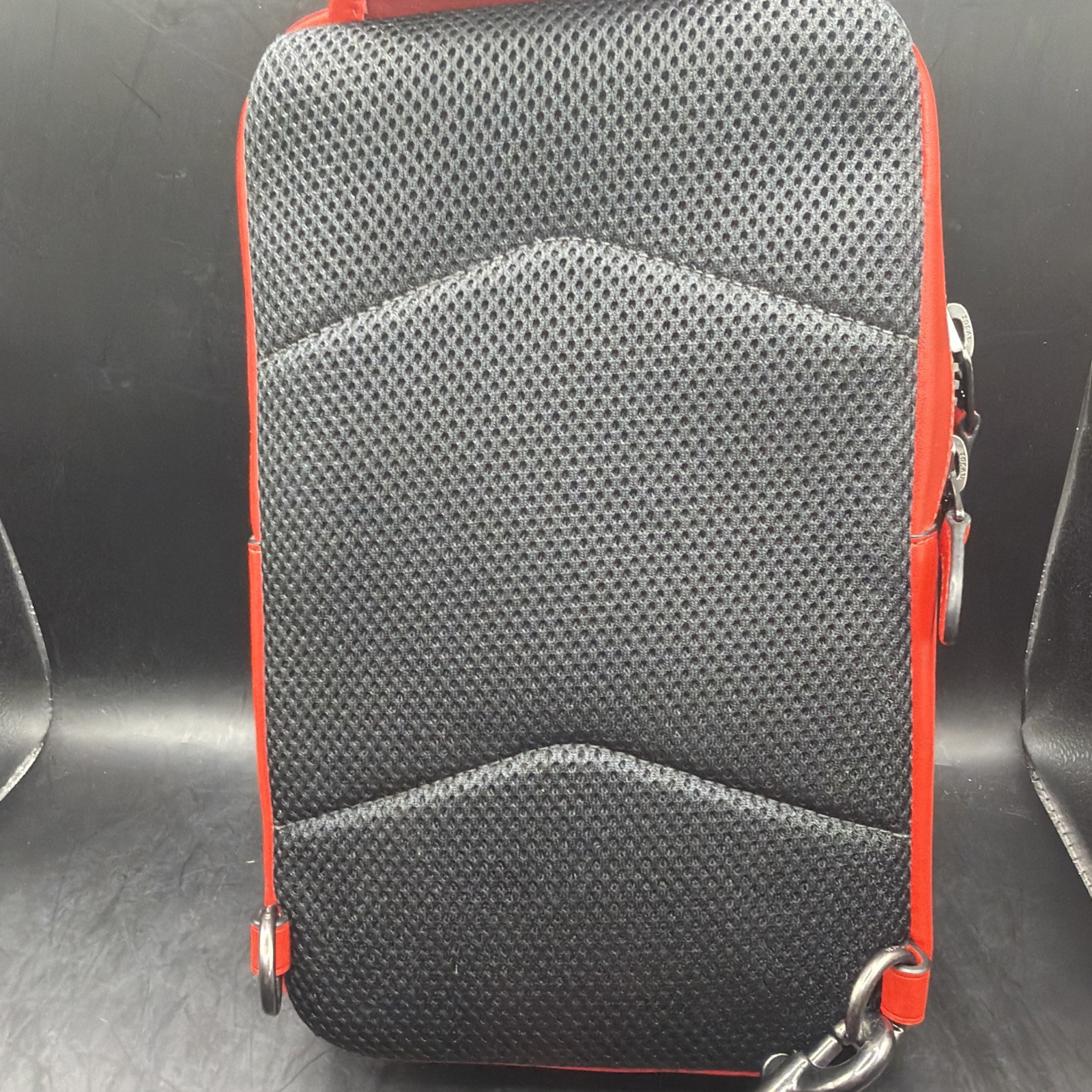 COACH Track Sling Backpack in Colorblock with Stamp in Red Ivory Orange