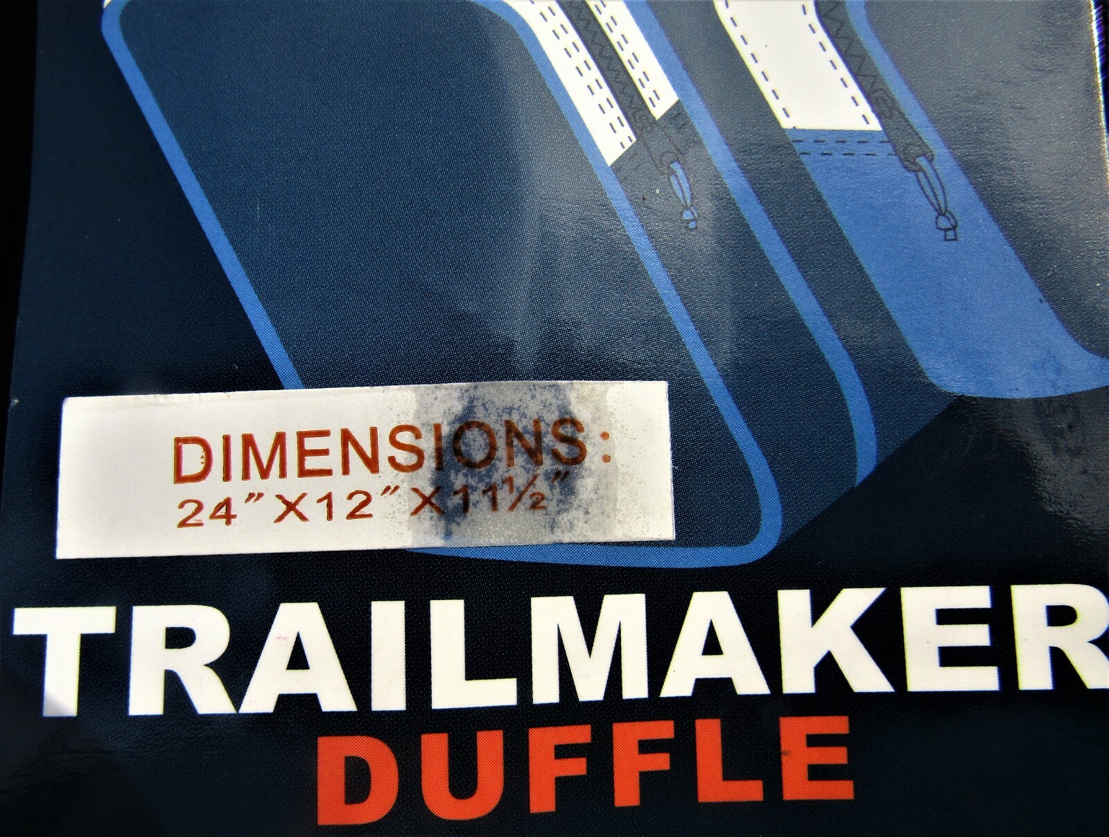 Trailmaker canvas duffel bag, blue and black, measures 24″ X 12X 11 1/2.