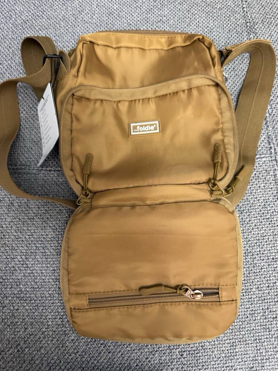 the foldie Small Brown Crossbody Sling Bag Zip Pockets Lined Adjustable Strap