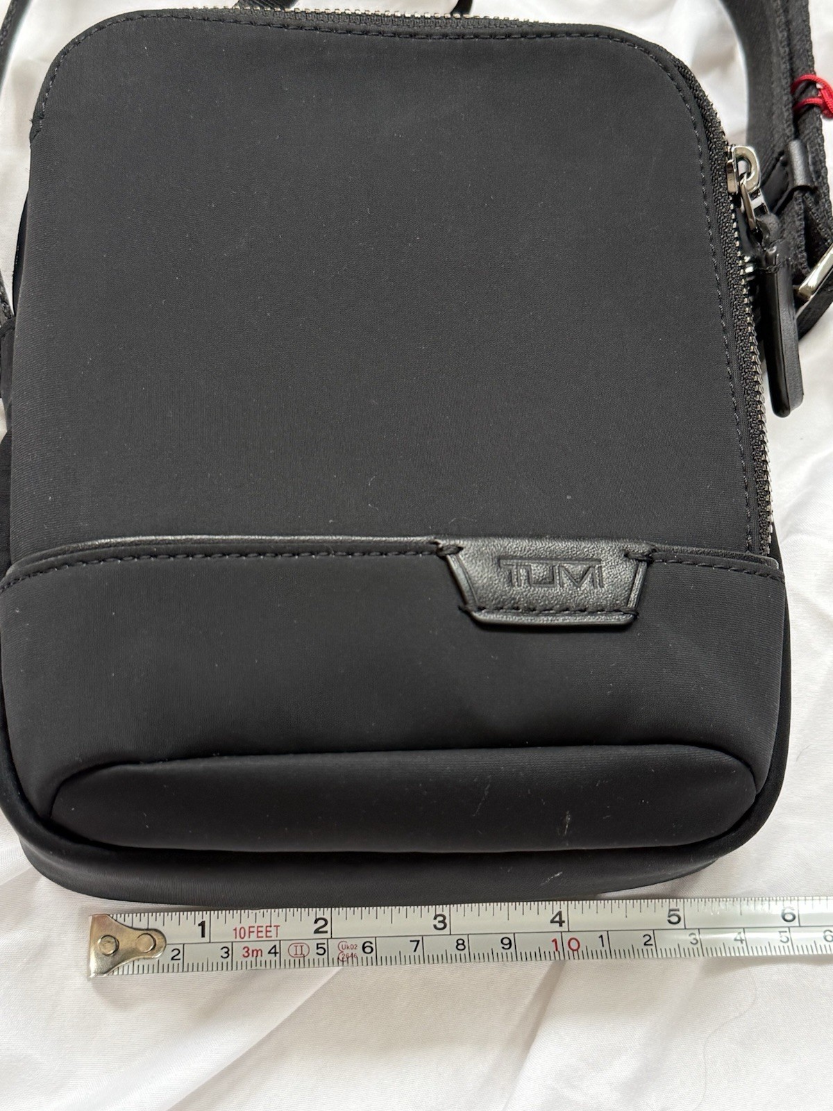 Tumi Harrison Small Crossbody Bag Black Zip Adjustable Strap Inner Pockets