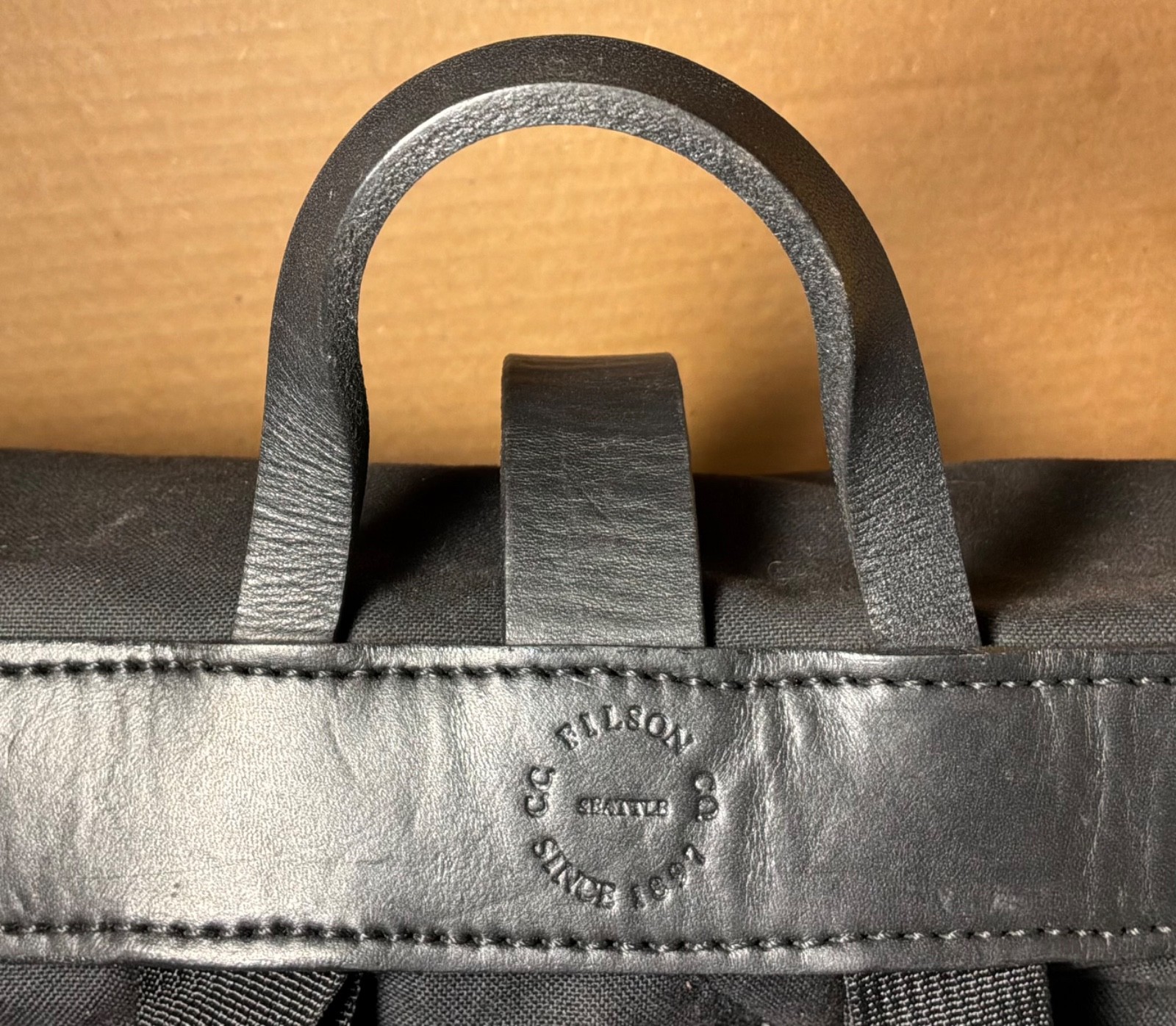 FILSON RUGGED BLACK BACKPACK w/LEATHER BRIDLE STRAPS & BRASS BUCKLES DRAWSTRING