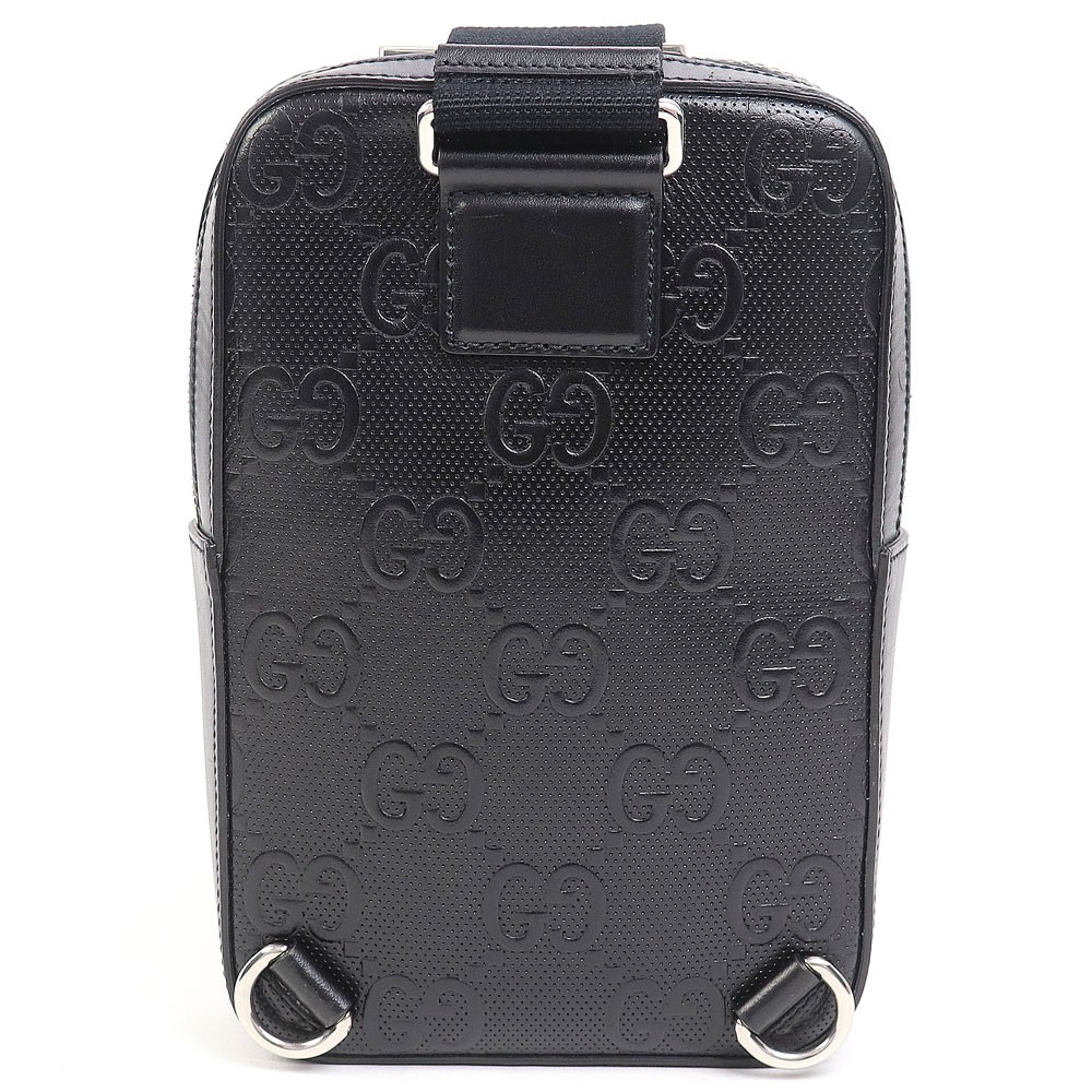 Gucci GG Embossed Sling Backpack Black Perforated Leather Crossbody Shoulder Bag