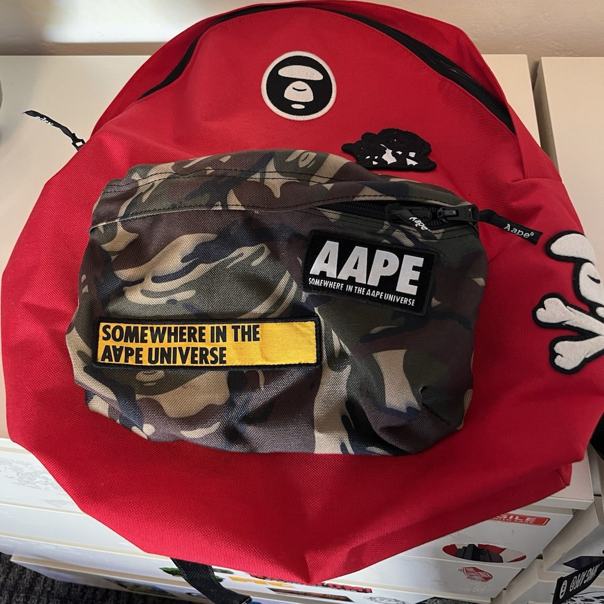 AAPE Red Men’s Backpack w/ Camo Front Pocket, Zip Closure, Shoulder Strap