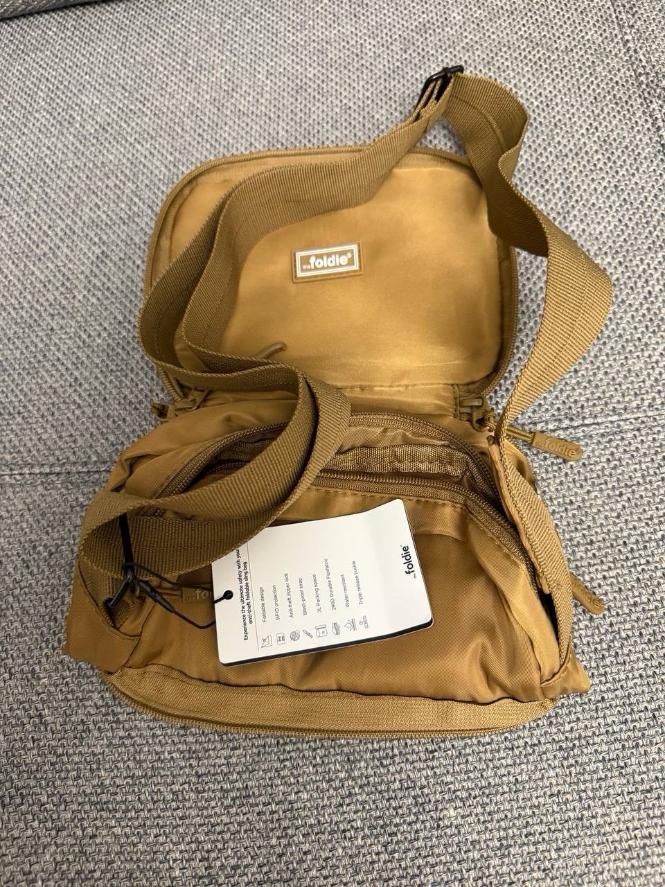 the foldie Small Brown Crossbody Sling Bag Zip Pockets Lined Adjustable Strap
