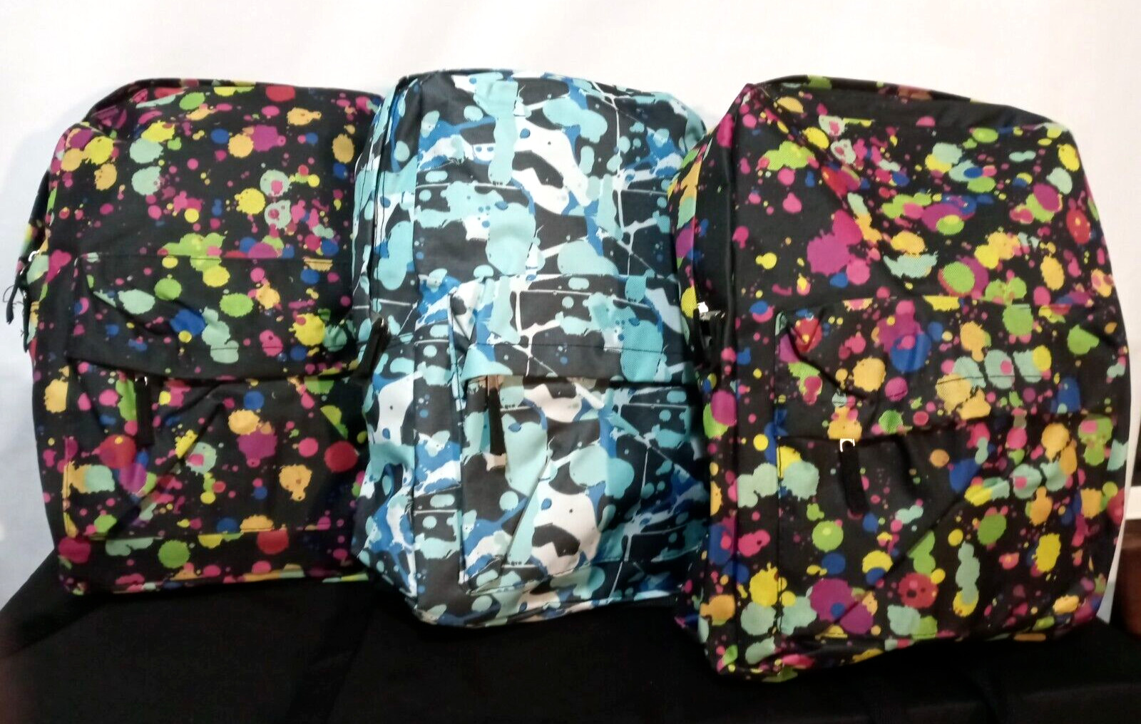 LOT OF THREE Paint Splatter/Abstract Air Express Multicolored Backpacks