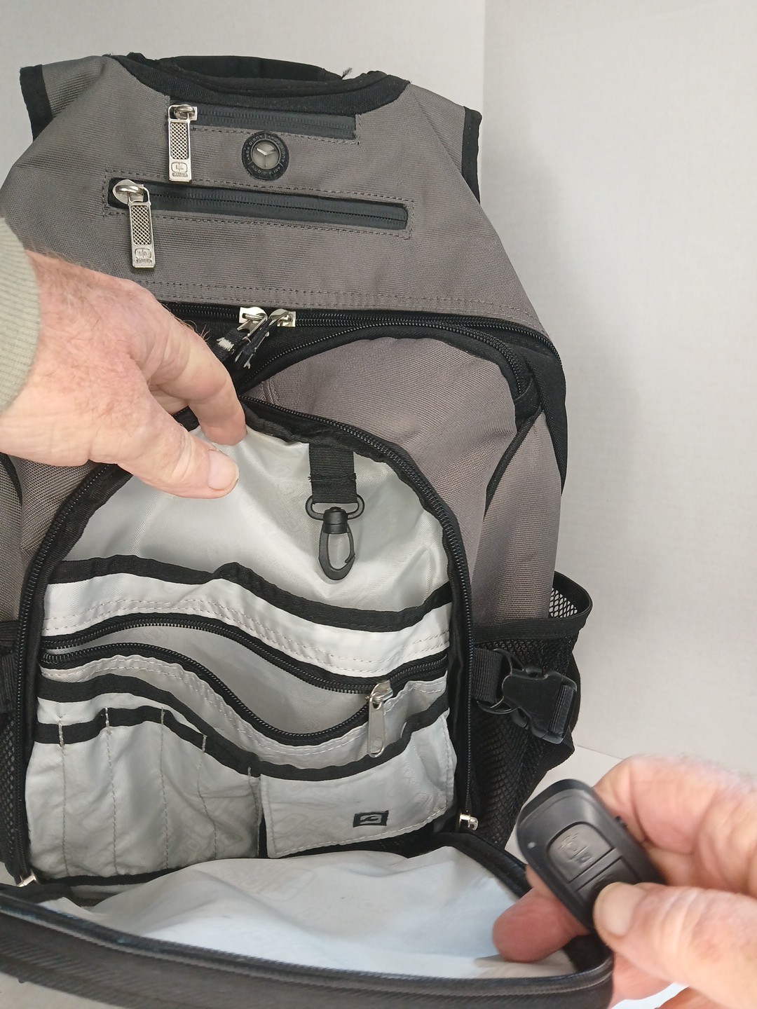 ogio backpack, Fugitive.Laptop compartment and phone compartment with cable port