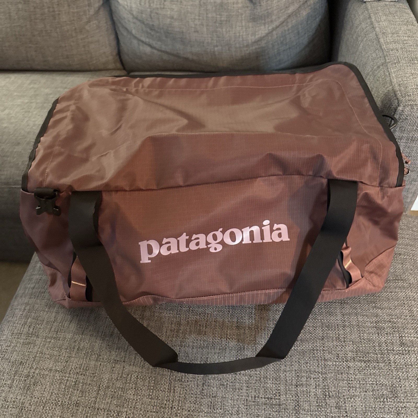 Brand New Patagonia Black Hole Duffel 55L w cute small MTV Hiphop logo