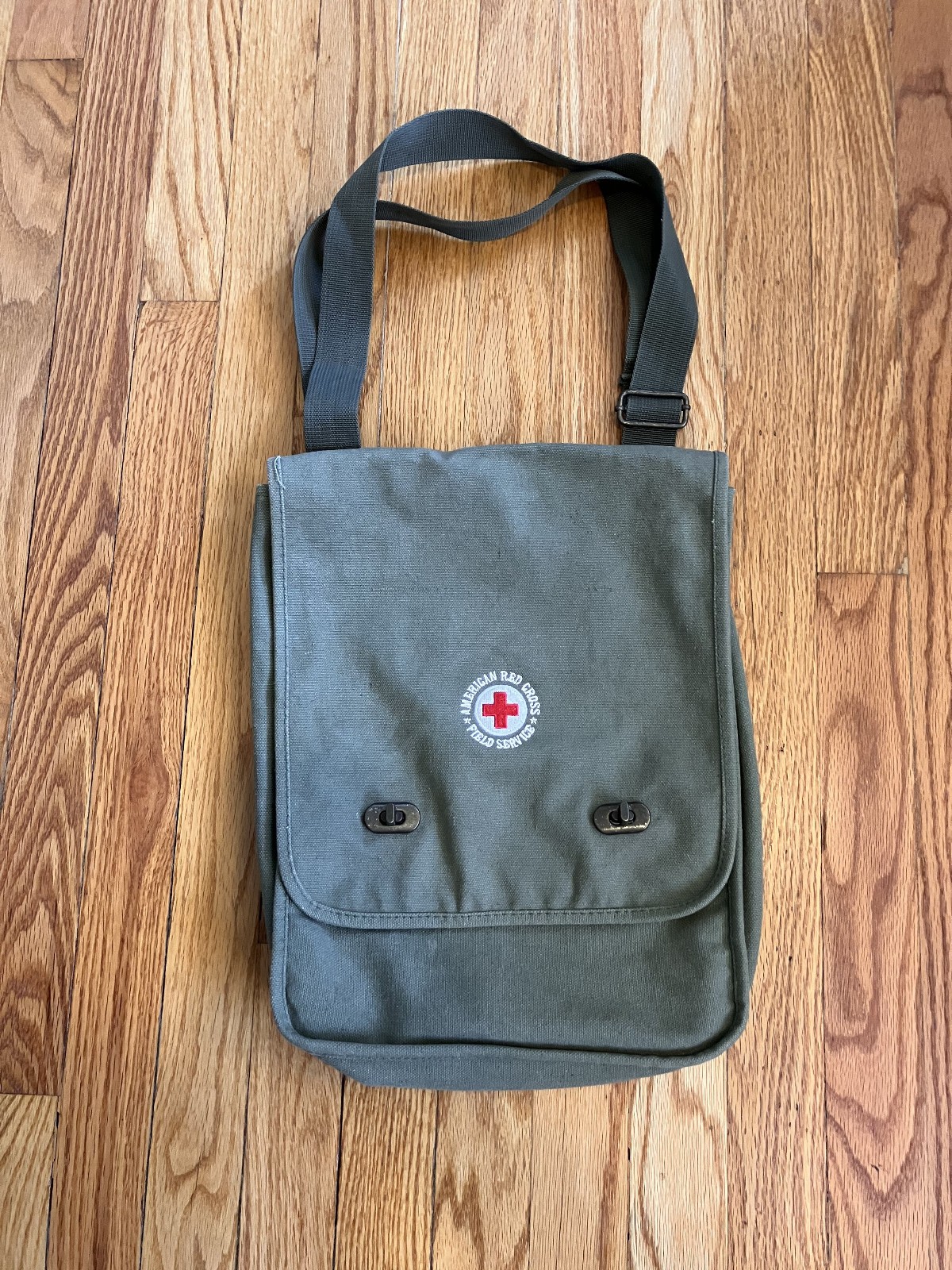 Olive green field bag – good condition – interior pouch with working zipper
