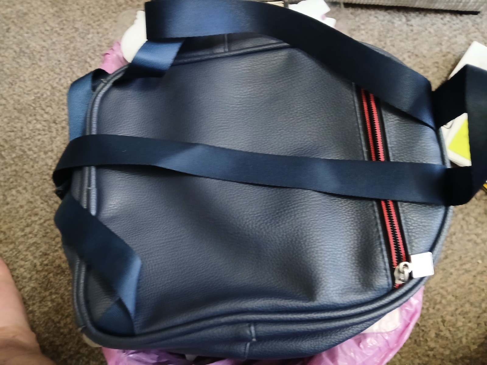 FILA SMALL BLACK BACKPACK WITH SIGNATURE ACROSS FRONT HAS 2 ZIPPERED SECTIONS