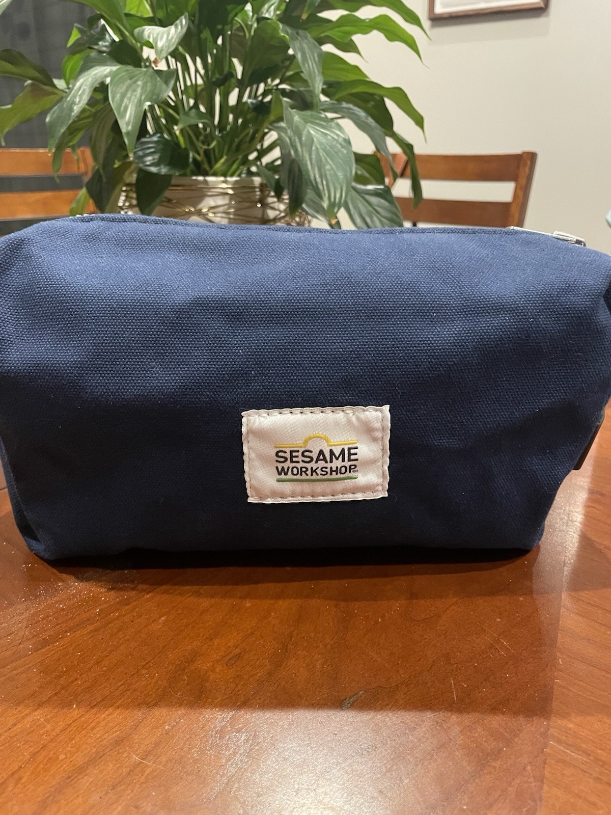 Steele Canvas Dopp Kit. Navy Blue Waxed Canvas With Sesame Workshop Logo. USA.