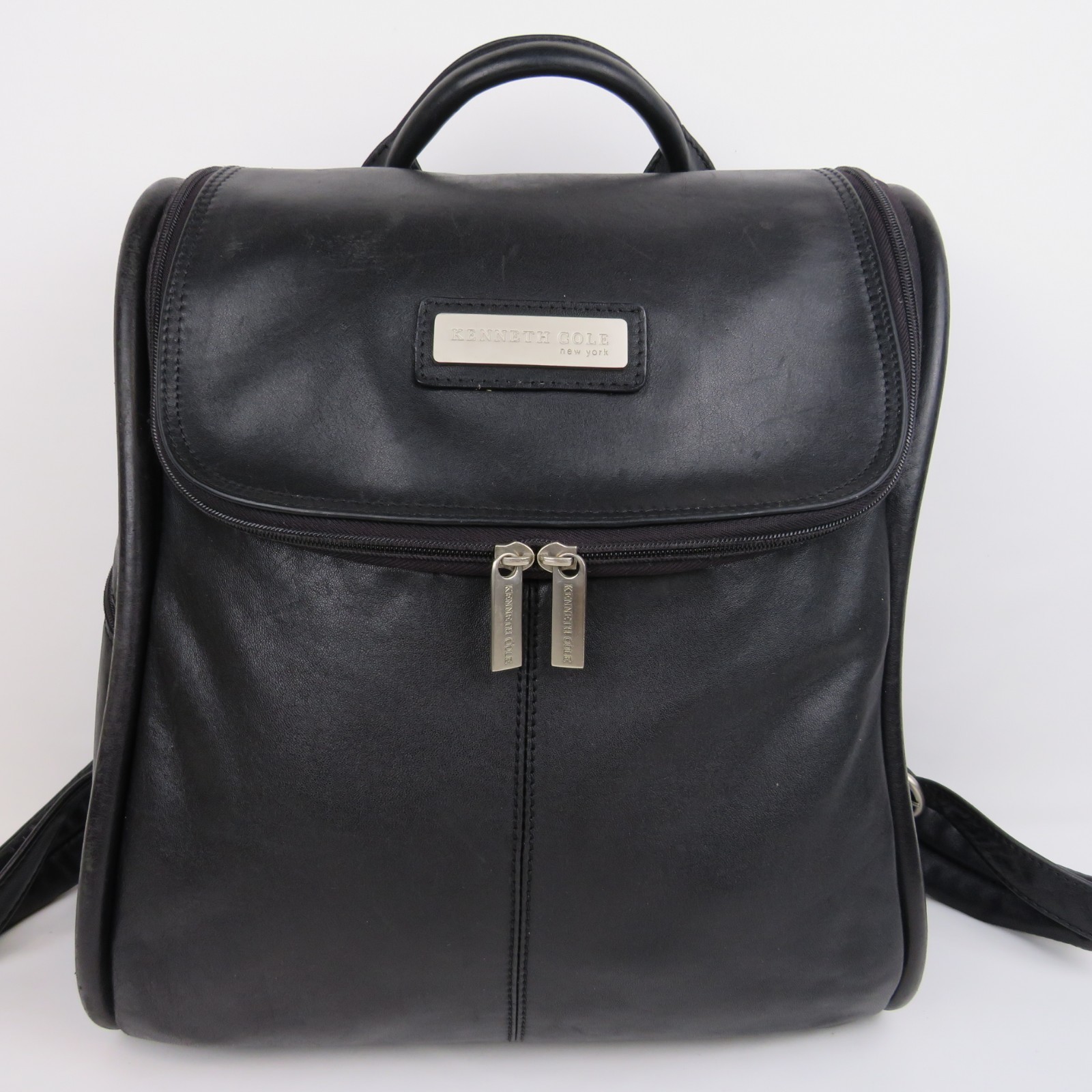 Kenneth Cole Black Leather Backpack Zipper Flap Padded Adjustable Straps Roomy