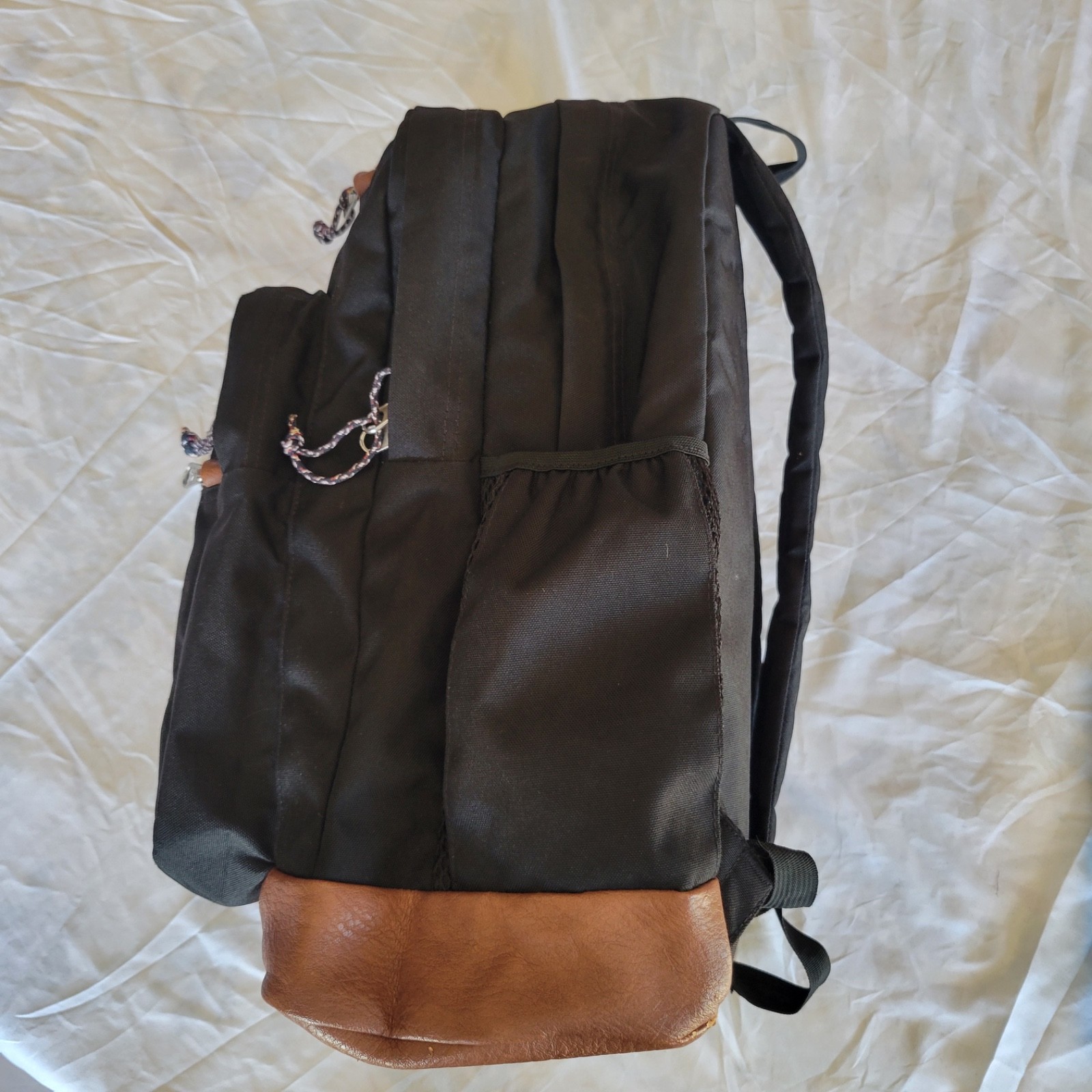 JanSport JS0A2SDD008 Cool Student Backpack – Black Faux Leather Bottom