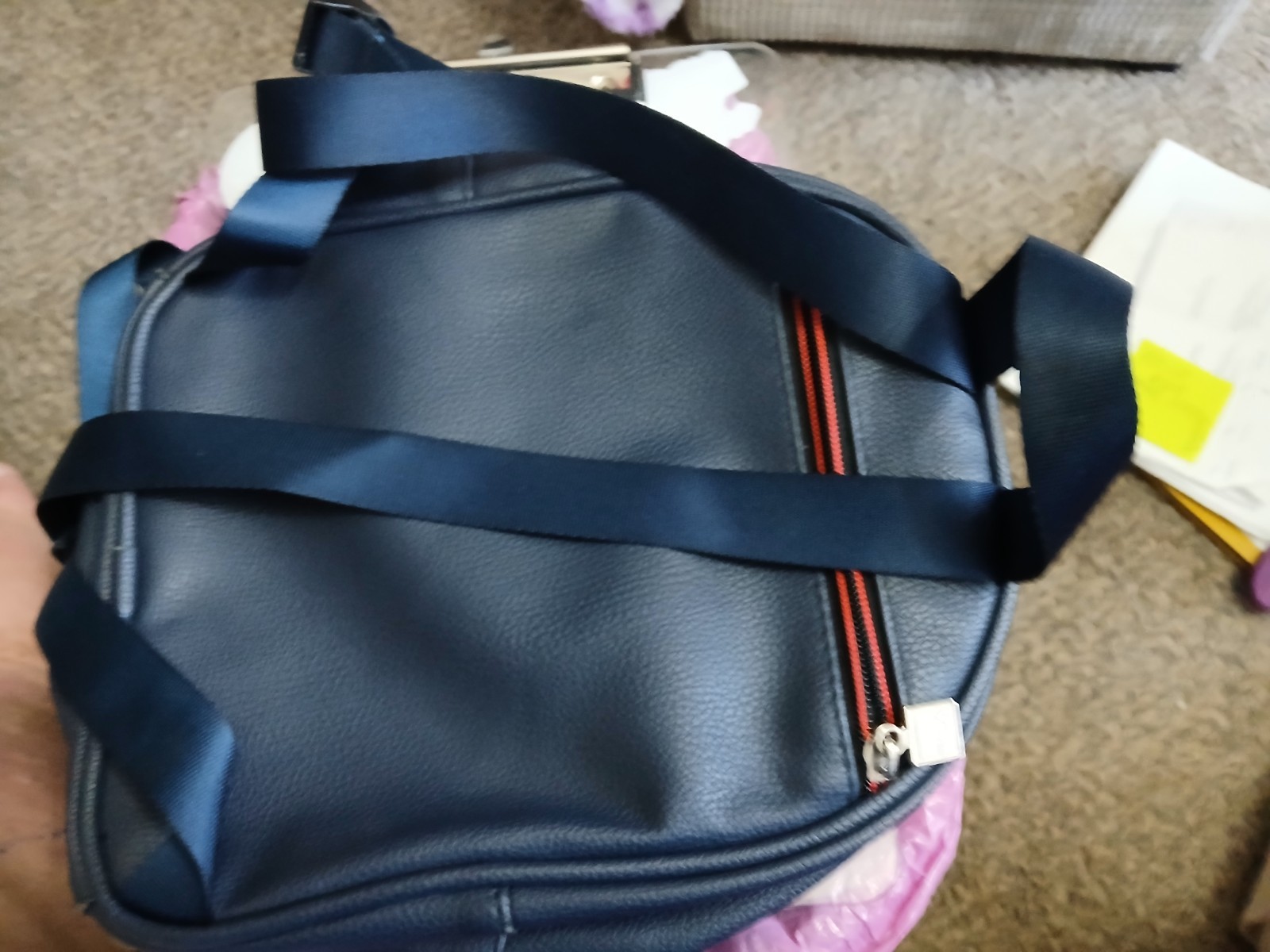 FILA SMALL BLACK BACKPACK WITH SIGNATURE ACROSS FRONT HAS 2 ZIPPERED SECTIONS