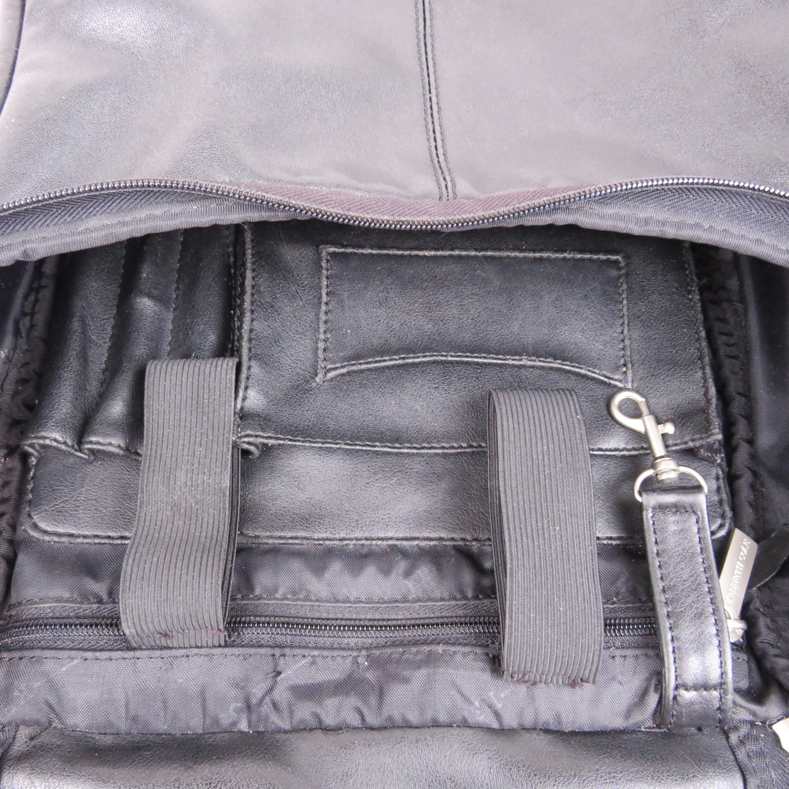Kenneth Cole Black Leather Backpack Zipper Flap Padded Adjustable Straps Roomy