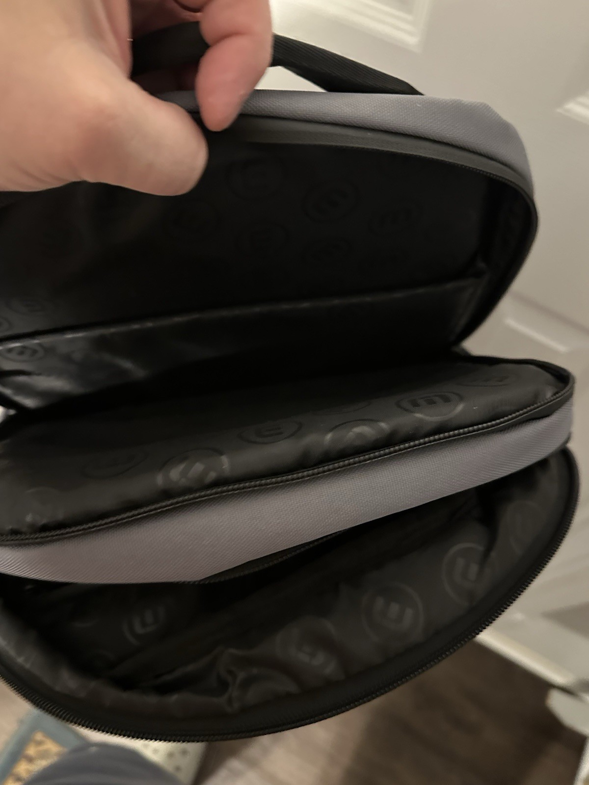 TravisMathew Duration Backpack in the graphite-gray colorway