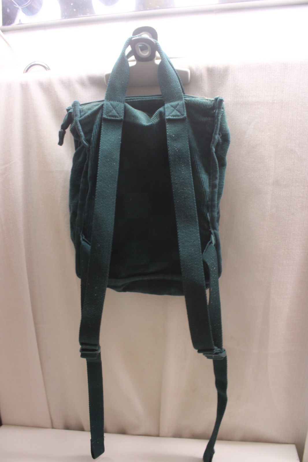Vans Mini Free Hand backpack in a deep teal corduroy Checkerboard 10X11X3inches