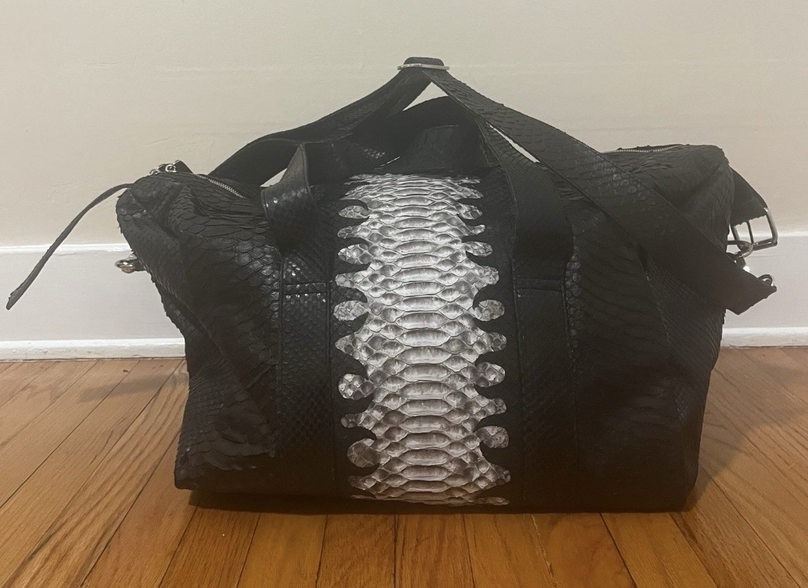Cool and stylish Python Duffle Bag. 100% real python leather. Unisex.