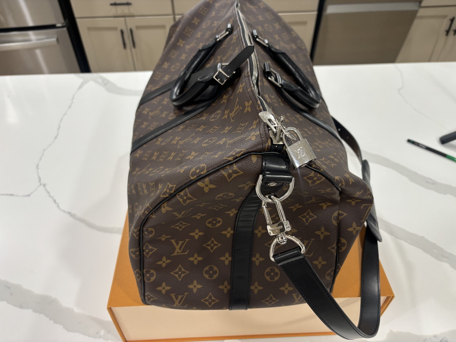 LOUIS VUITTON Keepall Bandoulière 55 in Monogram Macassar Canvas & Leather