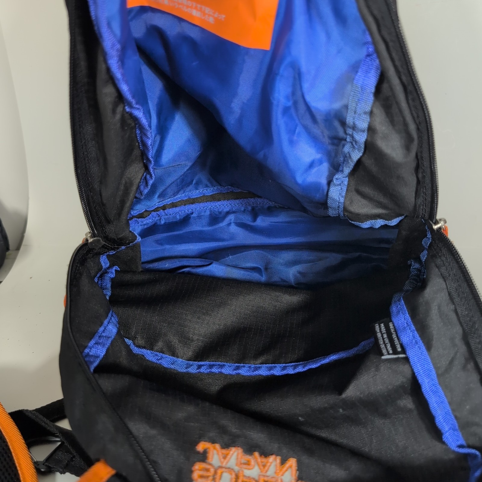 Superdry Tarp Backpack Black Orange Trim Travel Zip Pockets Water Resistant Bag