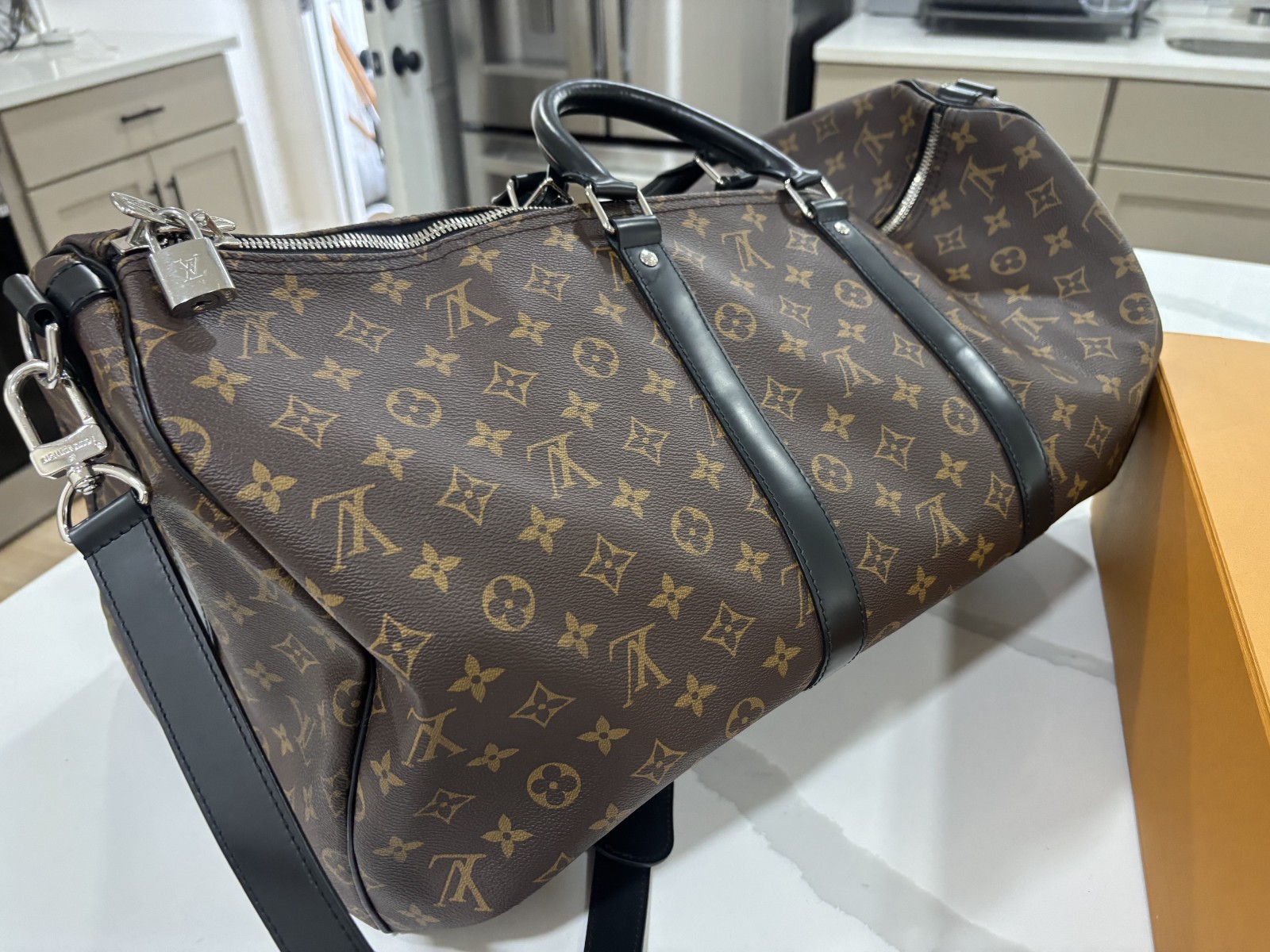 LOUIS VUITTON Keepall Bandoulière 55 in Monogram Macassar Canvas & Leather