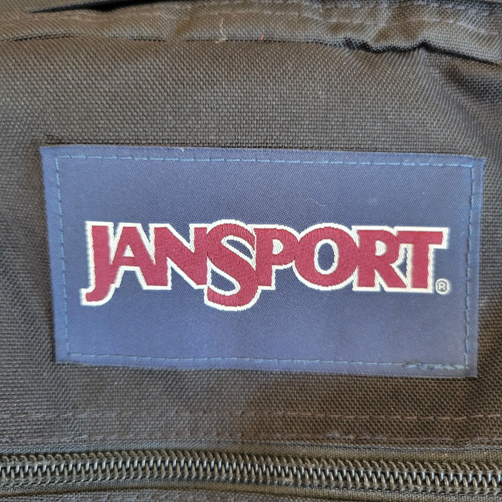 JanSport JS0A2SDD008 Cool Student Backpack – Black Faux Leather Bottom