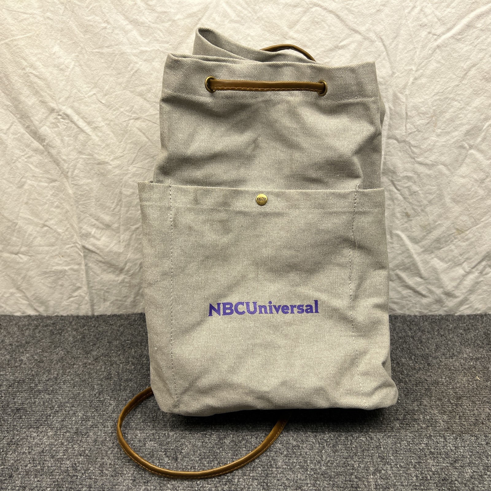 Field & Co. Leeds NBC Universal Logo Backpack Leather Straps Gray