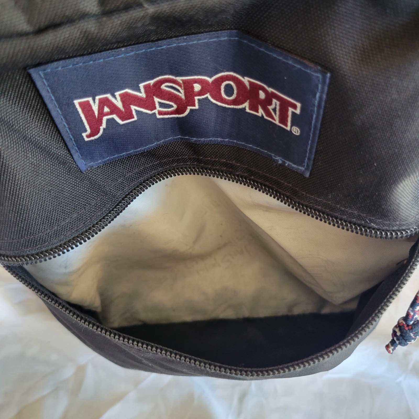 JanSport JS0A2SDD008 Cool Student Backpack – Black Faux Leather Bottom
