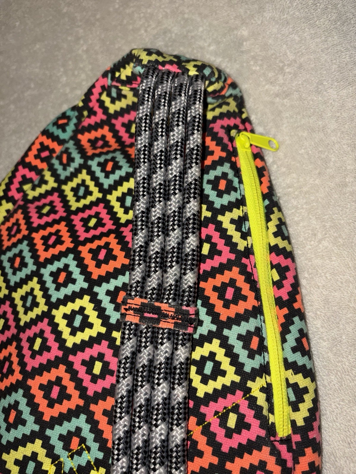 KAVU Multicolor Geometric Sling Bag Adj Crossbody Rope Zip Closure Cup Holder
