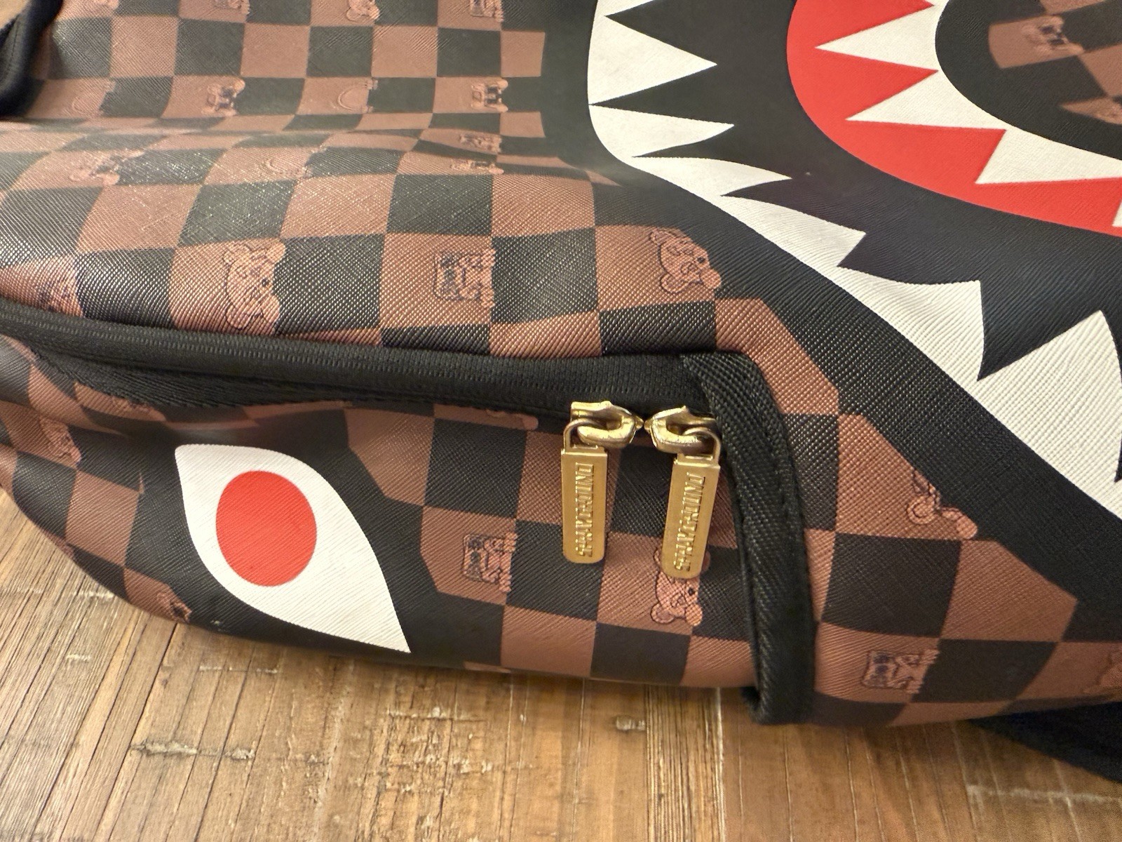 Sprayground Peeking Character Check Shark Mouth Backpack Brown Black Red Inside