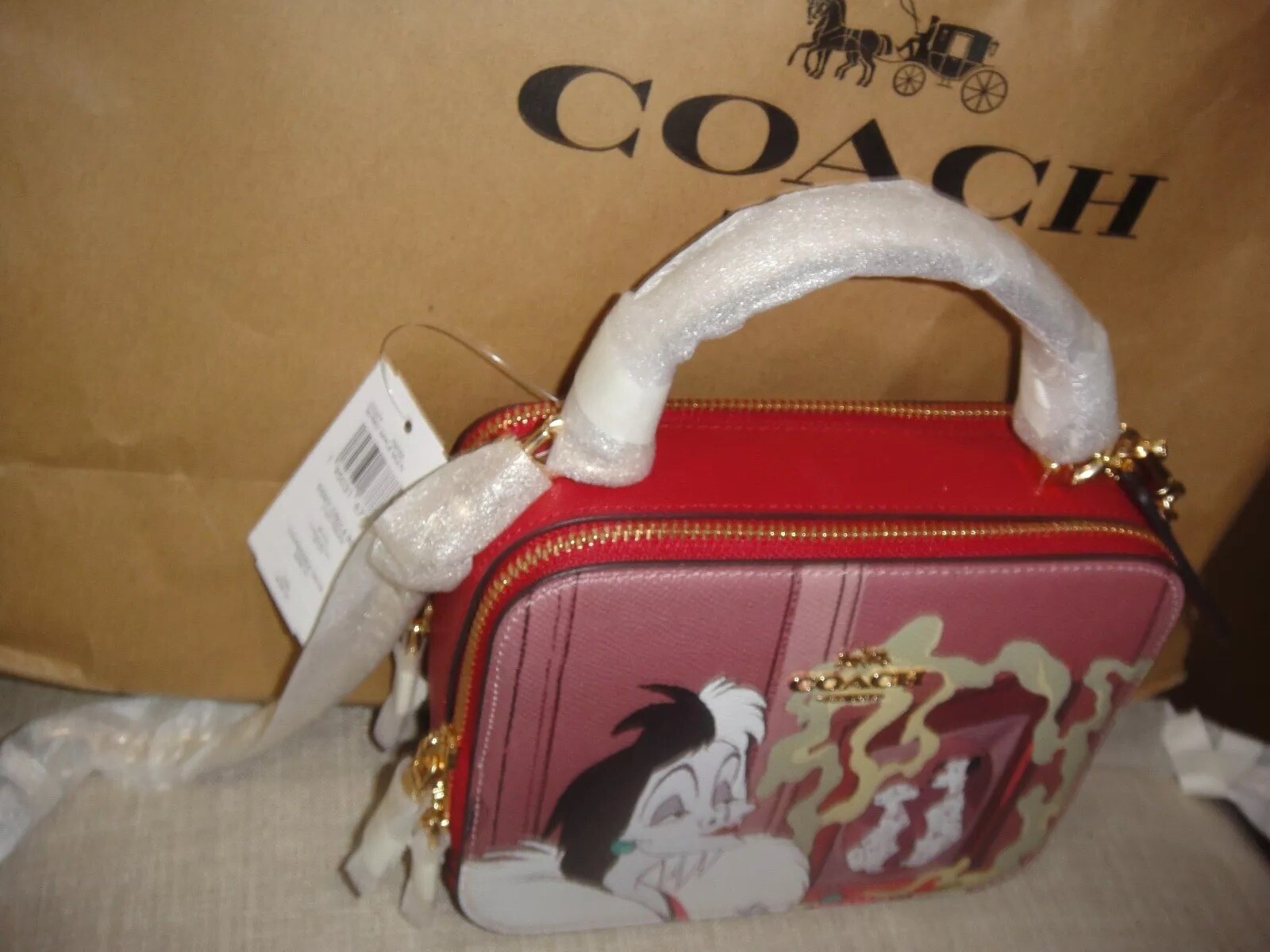 NEW COACH DISNEY CRUELA BOX APPLE MULTI CROSSBODY BAG.$398.00.MSRP 100%Authentic