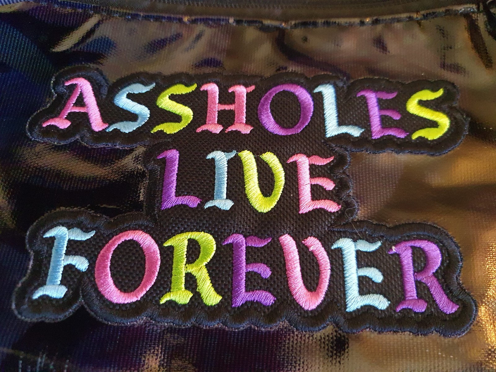 Assholes*s Live Forever “Have a Nice Trip” Duffle Bag – Black/Multicolor