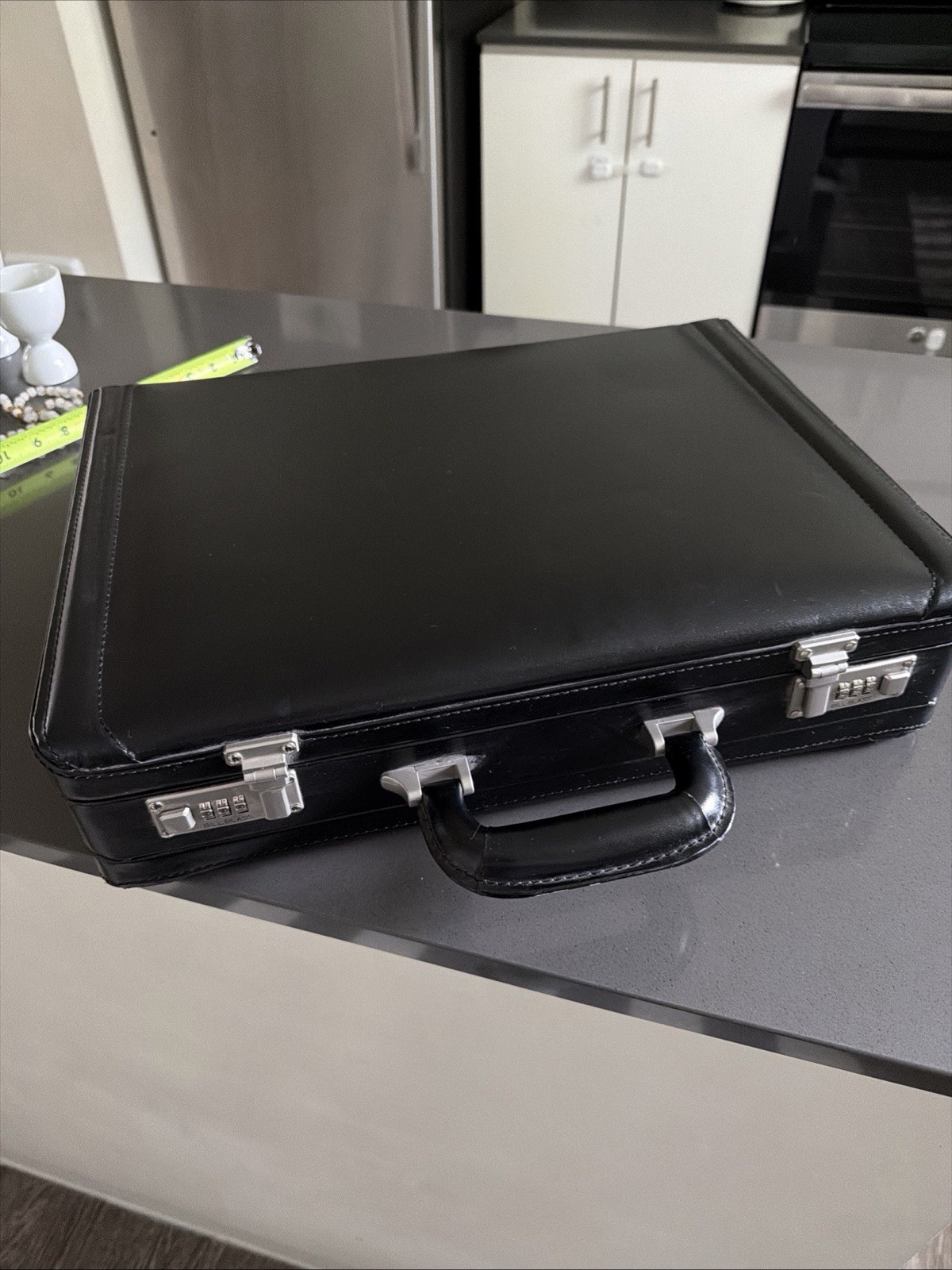vintage Bill Blass black leather briefcase with combination locks