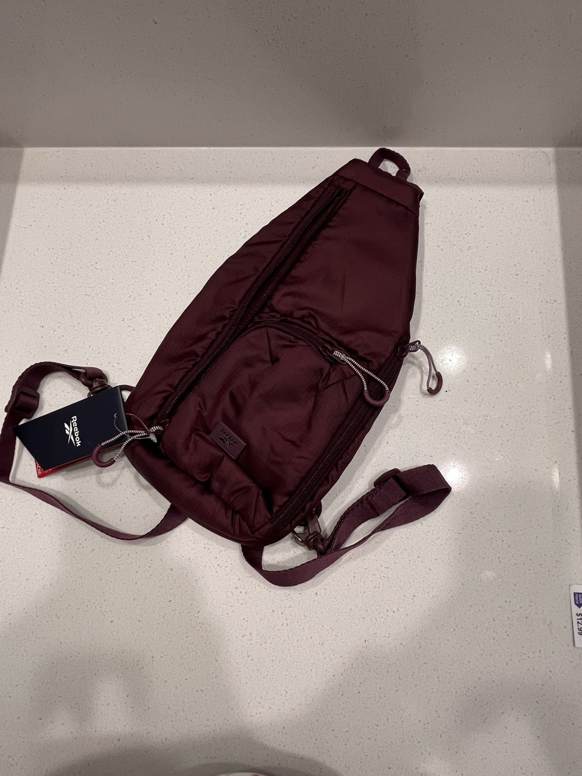 Reebok Burgundy Sling Crossbody Bag Zip Closure Adjustable Strap Outer Pockets
