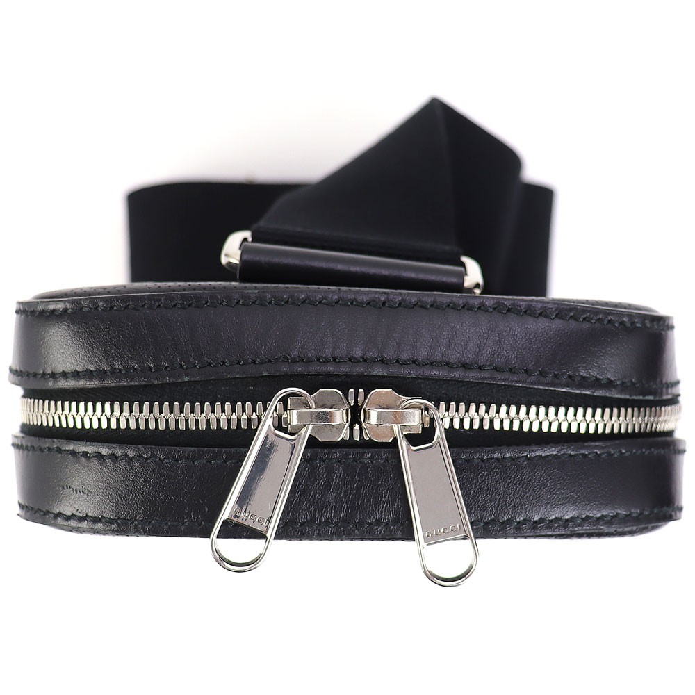 Gucci GG Embossed Sling Backpack Black Perforated Leather Crossbody Shoulder Bag