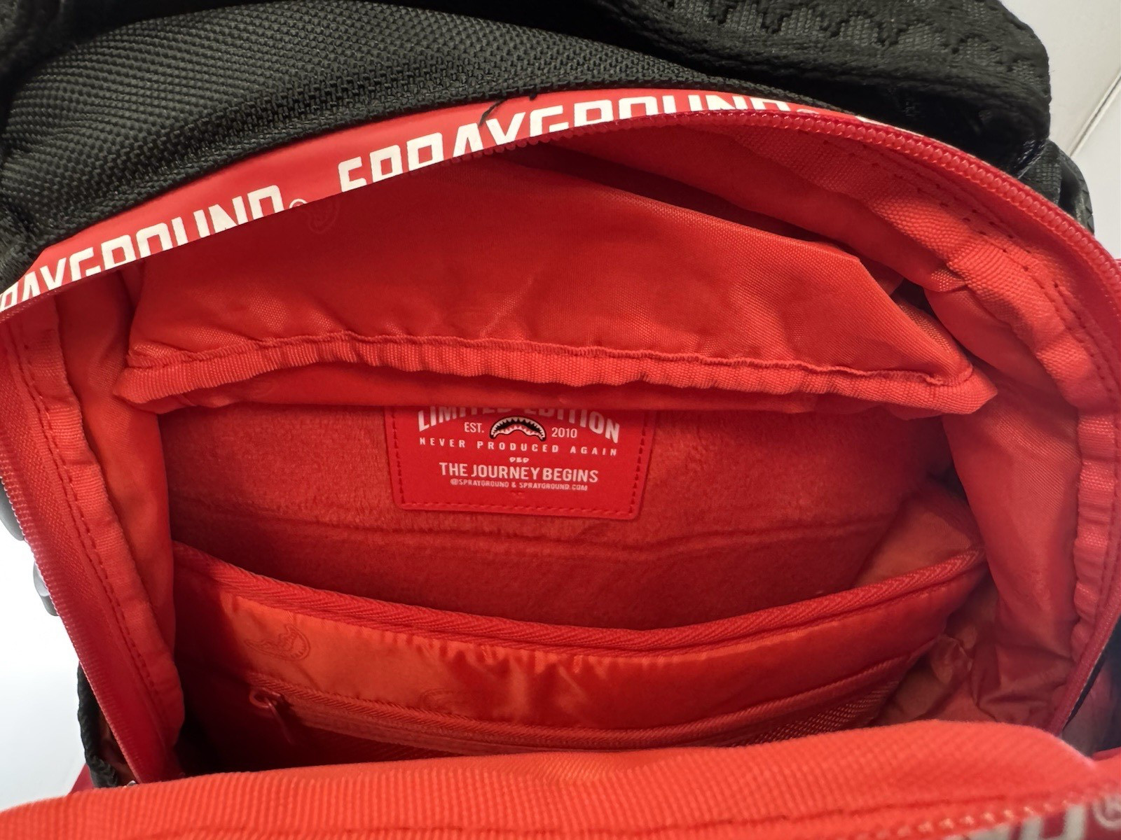 Sprayground The Hero Red Tape Limited Edition DLXR Backpack