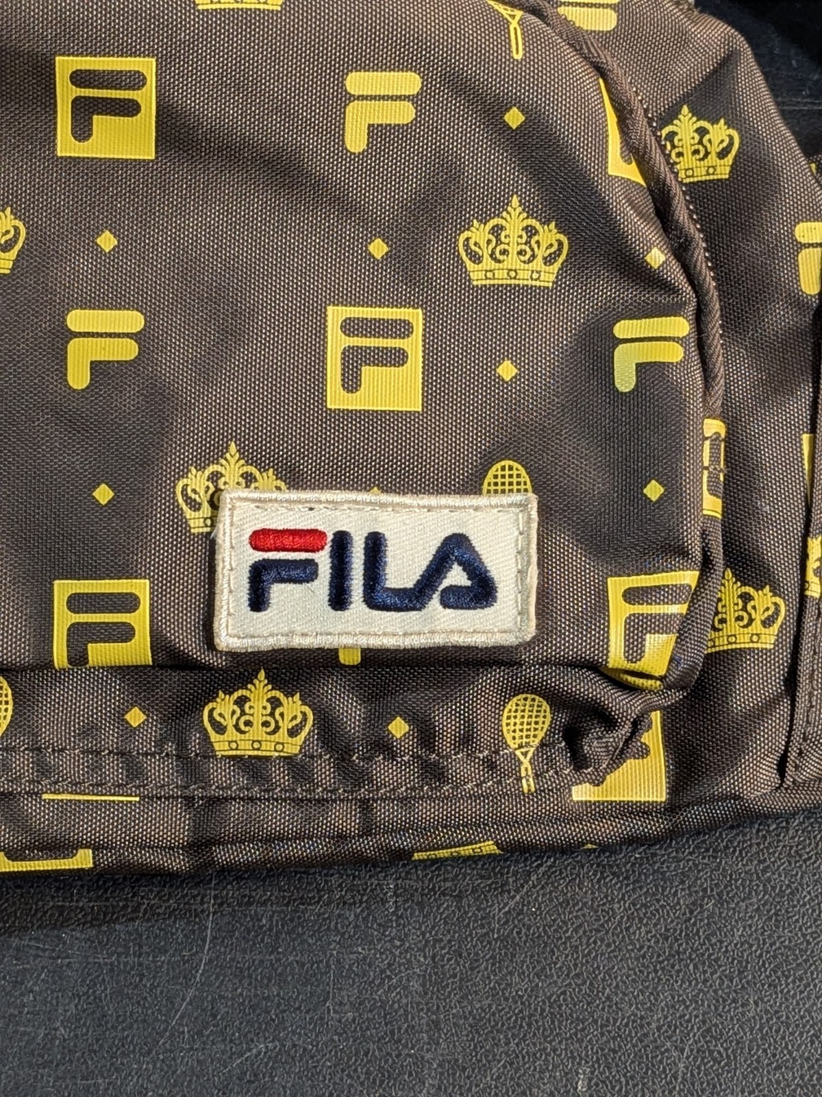 FILA + Urban Outfitters Monogram Sling Bag | 20″x7″x5″ Fanny Pack