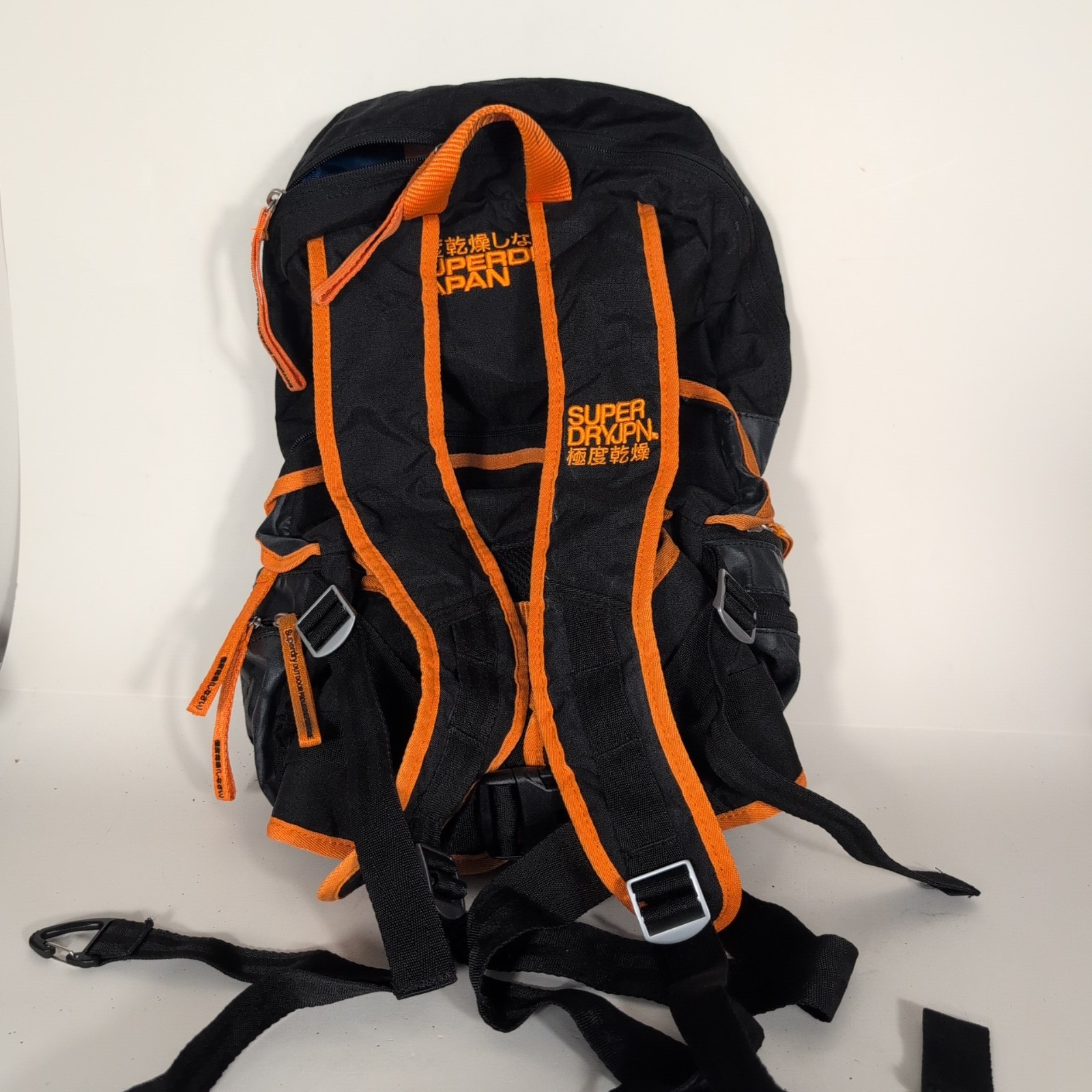 Superdry Tarp Backpack Black Orange Trim Travel Zip Pockets Water Resistant Bag